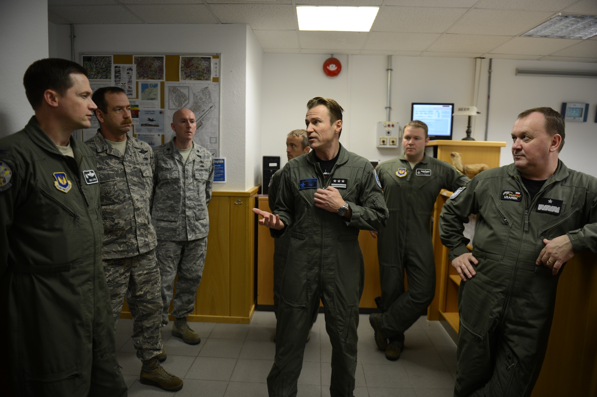 SPANGDAHLEM AIR BASE, Germany – Polish air force Col. Kristian Ziec, 32nd Air Base commander, speaks to members of the 480th Fighter Squadron during a visit to Spangdahlem Air Base Nov. 26, 2012.  The tour was held to enhance both countries' mission effectiveness as NATO partners. (U.S. Air Force photo by Airman 1st Class Gustavo Castillo/Released)