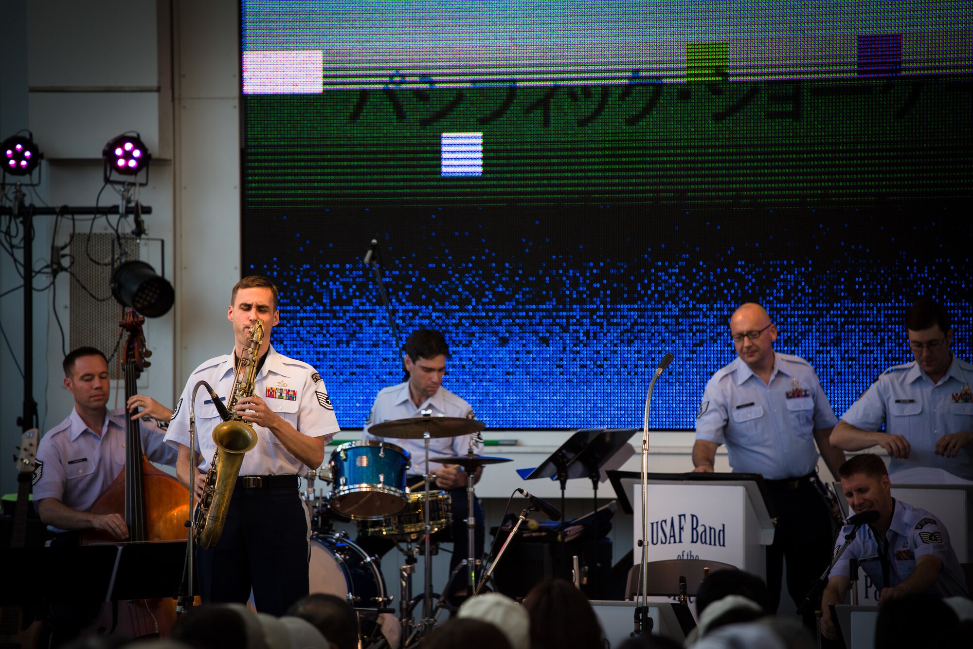 AKISHIMA, Japan -- Tech. Sgt. Ricky Sweum, Band of the Pacific Showcase saxophonist, solos at the Showa-no-Mori Music Festival, Akishima, Japan on Sept. 7, 2012. Sweum serves as the musical director for Pacific Showcase. (U.S. Air Force photo/Staff Sgt. Josh Voyles