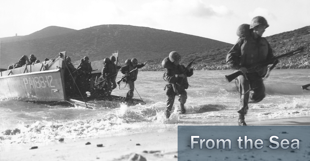 Marines take the beach at Guadalcanal circa 1942.