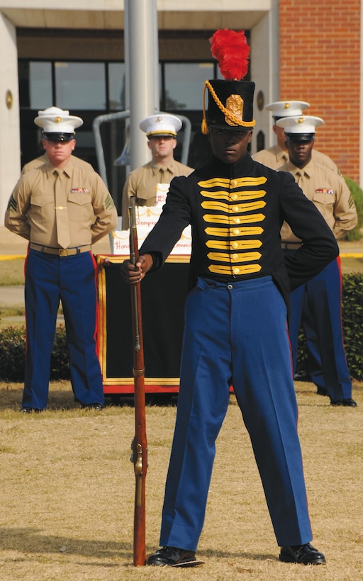 Cpl. JuVante Butler, administration specialist, Military Personnel Center, MCLB Albany, showcases a Marine Corps War of 1812 uniform during the Marine Corps birthday cake-cutting ceremony and uniform pageant in front of Building 3500, Nov. 7.