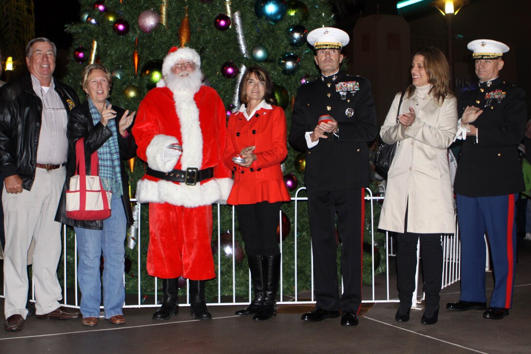Oceanside locals, Mayor Jim Wood and the city’s “favorite neighbors to the north,” members of Marine Corps Base Camp Pendleton including Brig. Gen. Vincent A. Coglianese,  base commanding general and regional authority for five military installations in the Southwestern United States, prepare to light the holiday tree during the 6th Annual Holiday Tree Lighting at the Regal Cinemas courtyard here Nov.29.
