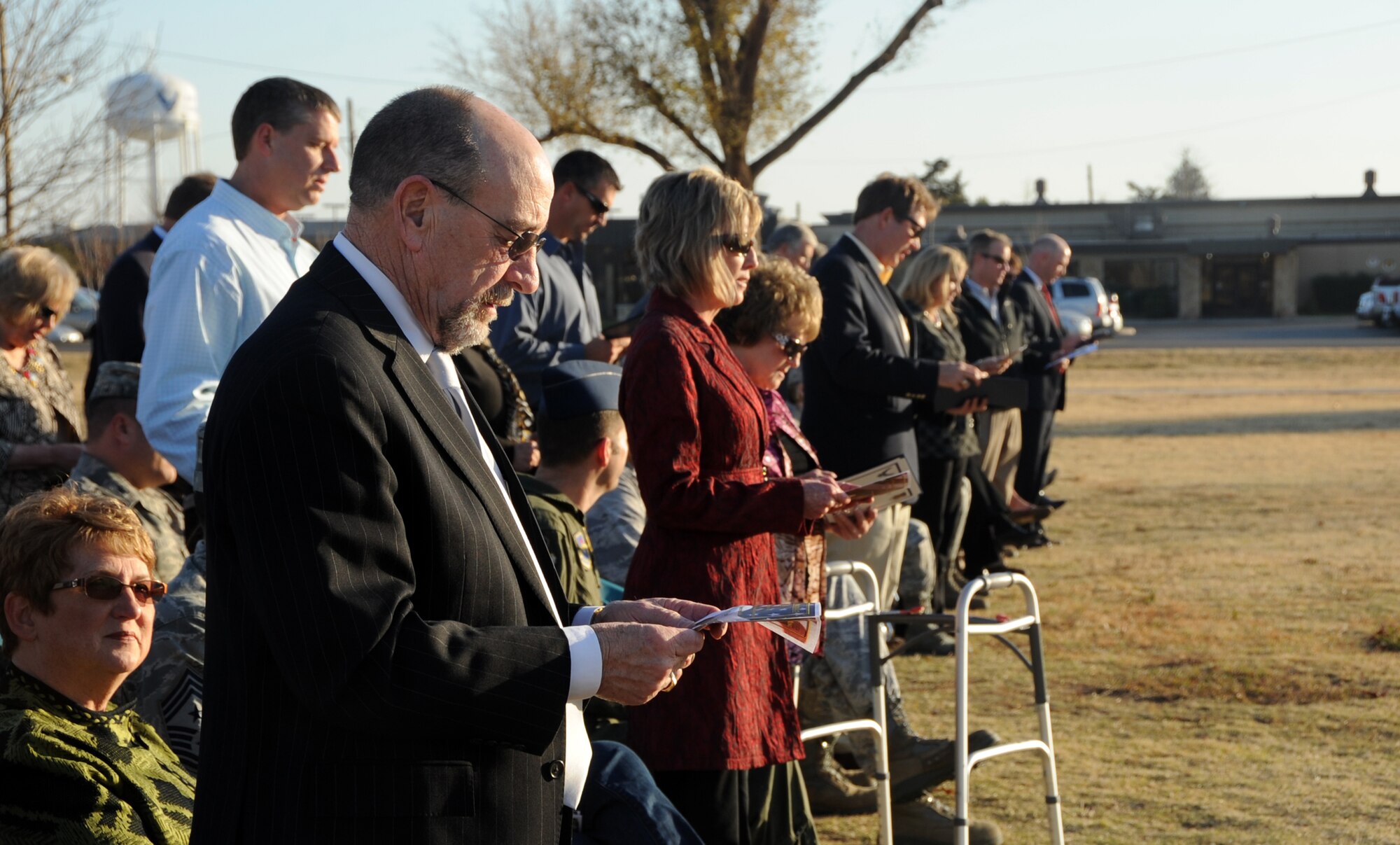 ALTUS AIR FORCE BASE, Okla. – Community leaders from the surrounding area recite the Honorary Commander’s Oath at the Honorary Commander Induction Ceremony at Wings of Freedom Park, Nov. 29, 2012. The ceremony was held to appoint community and business leaders as Honorary Commanders of Altus AFB groups and squadrons. The purpose of the Honorary Commander program is to foster and strengthen the friendship and partnership between the base and surrounding community. (U.S. Air Force photo by Airman 1st Class Levin Boland / Released) 