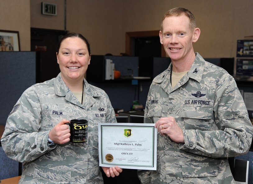 MINOT AIR FORCE BASE, N.D. -- Staff Sgt. Kathryn Palm, 5th Bomb Wing Advanced Programs Programs Security Manager, was awarded the Own It Award Nov. 30. She has epitomized the 5th BW commander’s vision of mission ownership by single-handedly revitalizing the Bomb Wing’s Advanced Program office, and has made great strides toward exceeding all Air Force Global Strike Command requirements. Her transformation of the program included the creation of the Wing Standard Operating Procedures for Advanced Programs, three vital program checklists, and the identification and rapid implementation of corrective actions for 39 errors. Additionally, she has expedited three candidates processing with 57 WG to ensure USAF Weapons School timelines were met. Despite her grueling work-load, she has made time for leadership in several base activities as well, including President of the Defenders Association, PTL, and spearheading a Dining-In committee. Palm truly “Owns It” everyday! (U.S. Air Force photo/Airman 1st Class Andrew Crawford)