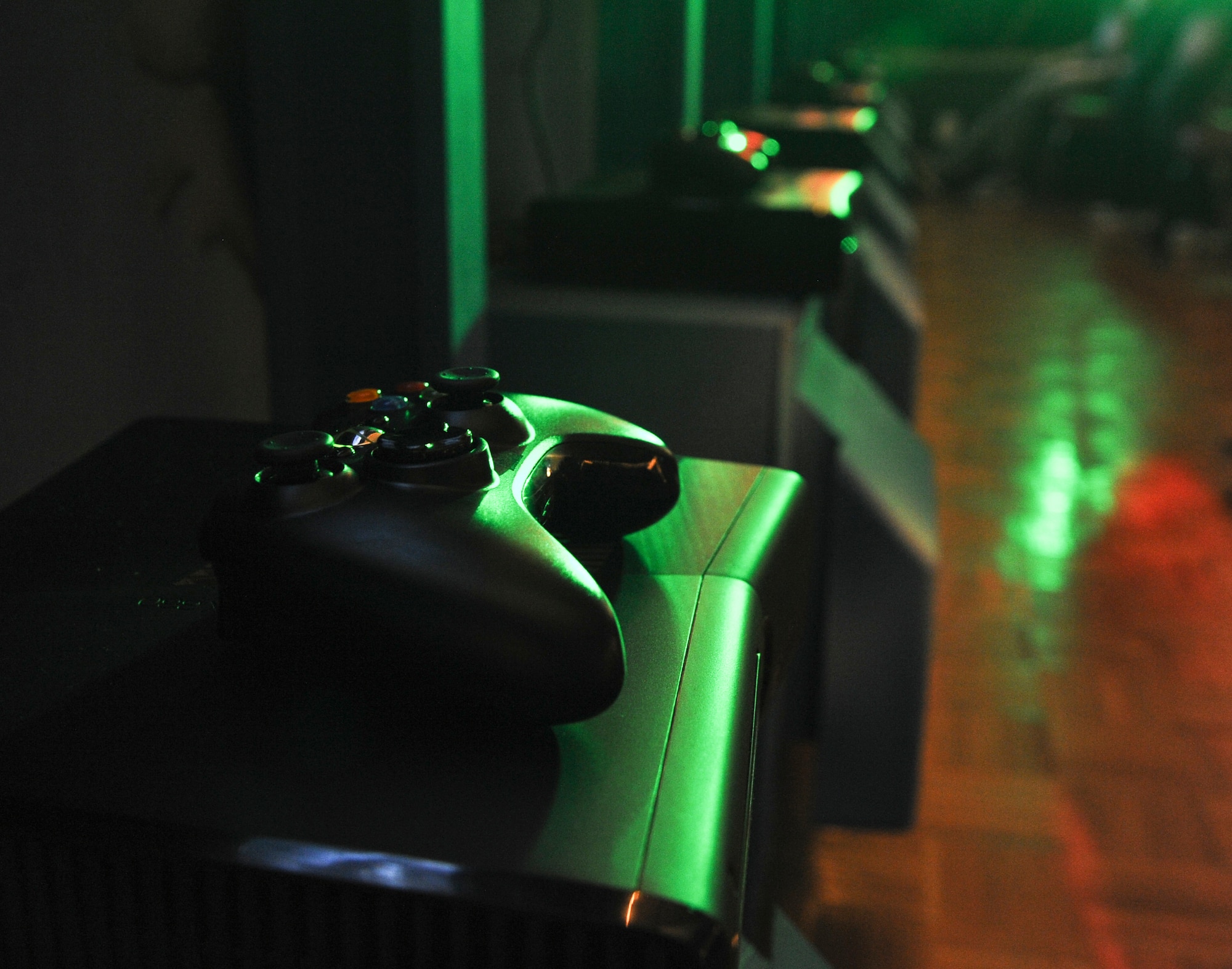 A video game controller sits on a gaming console during Game-Tastic Fest on Barksdale Air Force Base, La., Nov. 16. Game-Tastic Fest was a video game tournament that featured two of the latest first-person shooter video games. Several prizes such as video games, memorabilia and special edition gaming consoles were raffled off during the event. (U.S. Air Force photo/Senior Airman Micaiah Anthony)