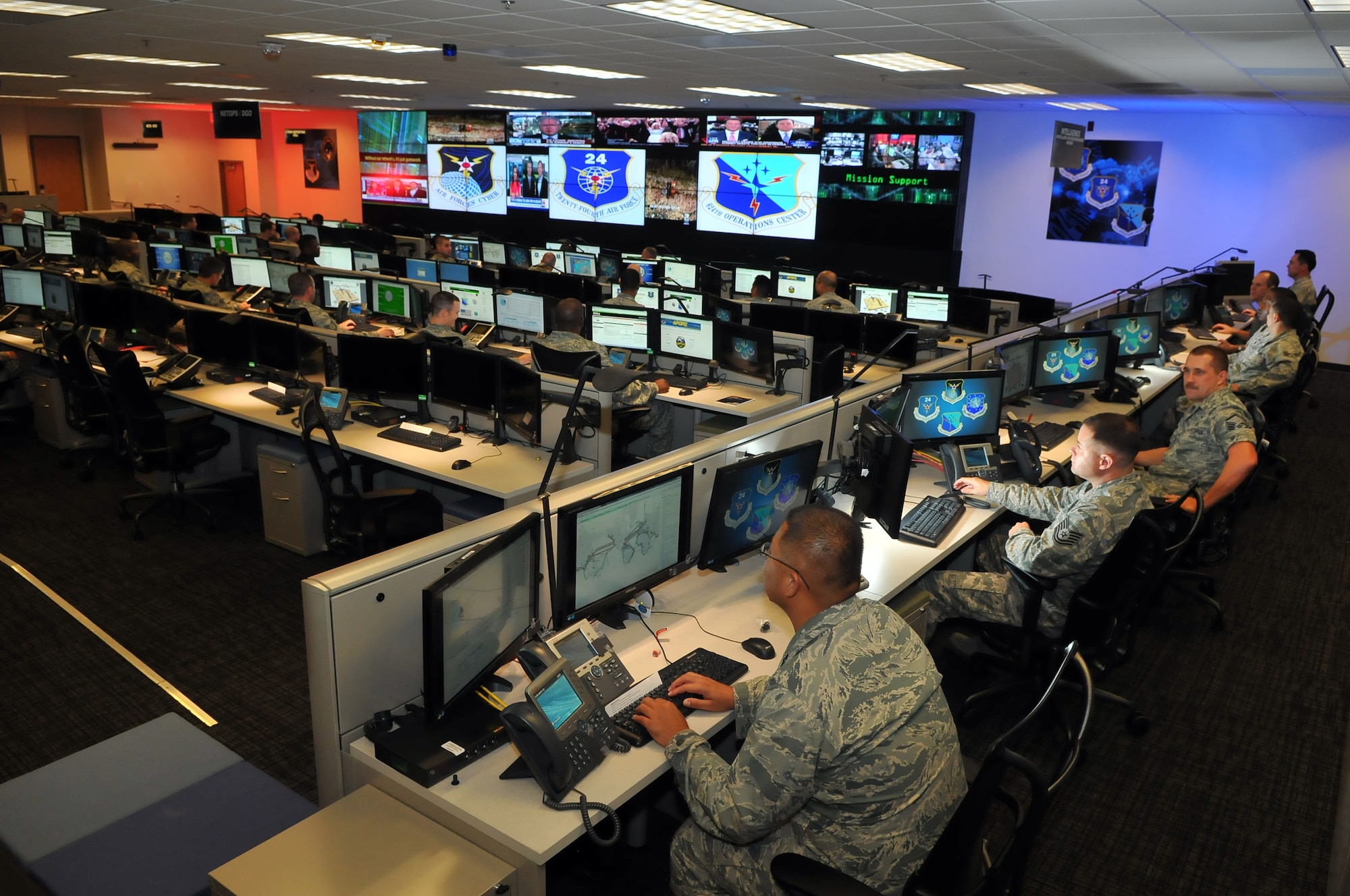Personnel of the 624th Operations Center, located at Joint Base San
Antonio - Lackland, conduct cyber operations in support of the command and
control of Air Force network operations and the joint requirements of Air
Forces Cyber, the Air Force component of U.S. Cyber Command. The 624th OC is
the operational arm of the 24th Air Force, and benefits from lessons learned
during exercises such as Cyber Flag 13-1. (U.S. Air Force photo by William
Belcher)
