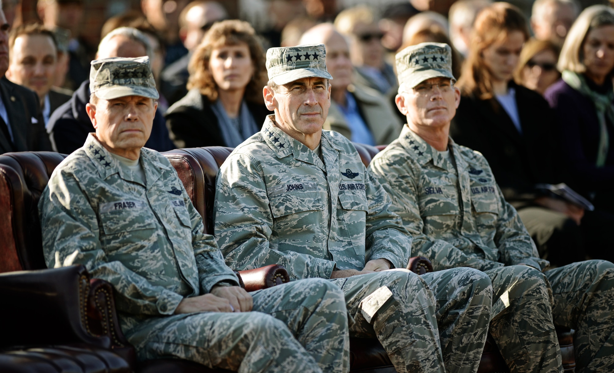 Generals William M. Fraser III, Ryamond E. Johns Jr., and Paul J. Selva listen as Gen. Mark A. Welsh III, Chief of staff of the Air Force, speaks during the Air Mobility Command change of command ceremony at Scott Air Force Base, Nov. 30, 2012. Welsh presided over the transition from Gen. Raymond E. Johns Jr. to Gen. Paul J. Selva. Johns served 35 years in the Air Force, commanding more than 130,000 Airmen as well as reaching 4,500 flight hours in various aircraft. The incoming AMC commander, Selva, was previously assigned as the assistant to the Chairman of the Joint Chiefs of Staff in Washington D.C. (U.S. Air Force photo/ Staff Sgt. Ryan Crane)