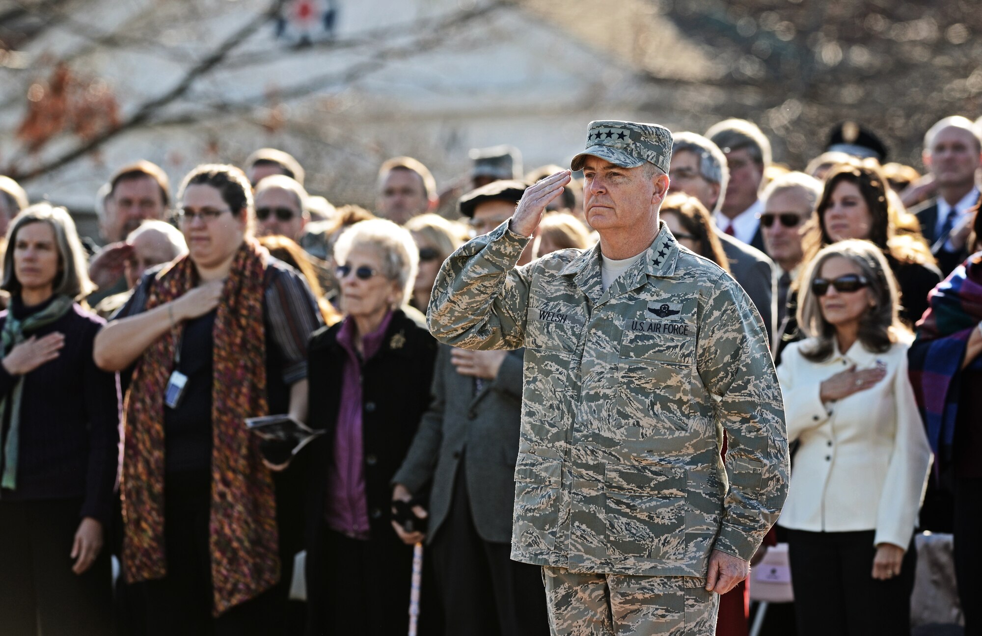 Gen. Mark A. Welsh III, Chief of staff of the Air Force, renders a salute to the colors during the Air Mobility Command change of command ceremony at Scott Air Force Base, Nov. 30, 2012. Welsh presided over the transition from Gen. Raymond E. Johns Jr. to Gen. Paul J Selva. Johns served 35 years in the Air Force, commanding more than 130,000 Airmen as well as reaching 4,500 flight hours in various aircraft. The incoming AMC commander, Selva, was previously assigned as the assistant to the Chairman of the Joint Chiefs of Staff in Washington D.C. (U.S. Air Force photo/ Staff Sgt. Ryan Crane)