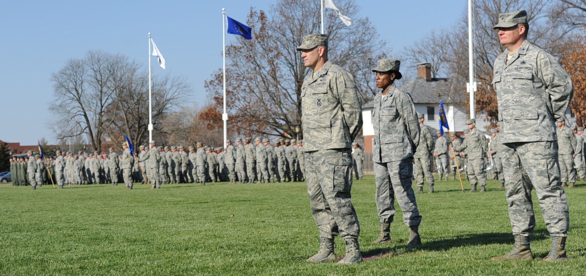 Members of Scott Air Force base stand at parade rest before a pass and review at the Air Mobility Command change of command ceremony during the change of command ceremony at Scott Air Force Base Nov. 30, 2012. The outgoing commander, Gen. Raymond E. Johns Jr. served 35 years in the Air Force, commanding more than 130,000 Airmen as well as reaching 4,500 flight hours in various aircraft. (U.S. Air Force photo/ Senior Airman Tristin English)