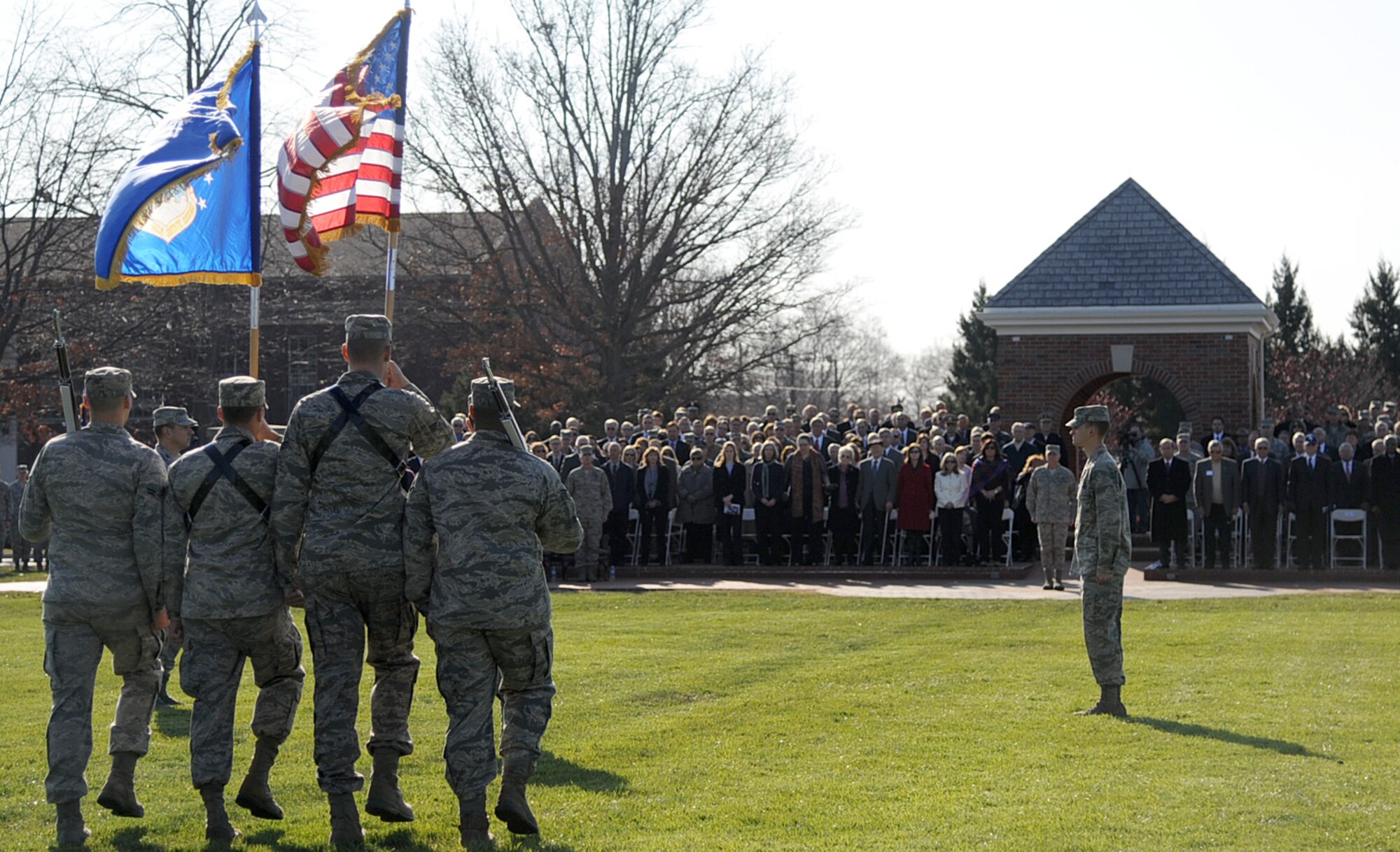 The Scott Air Force Base Honor Guard presents the colors, during the change of command ceremony at Scott Air Force Base, Nov. 30, 2012. The incoming AMC commander, Gen. Paul J. Selva  was previously assigned as the assistant to the Chairman of the Joint Chiefs of Staff in Washington D.C. The outgoing commander, Gen. Raymond E. Johns Jr., served 35 years in the Air Force, commanding more than 130,000 Airmen as well as reaching 4,500 flight hours in various aircraft. (U.S. Air Force photo/ Senior Airman Tristin English)