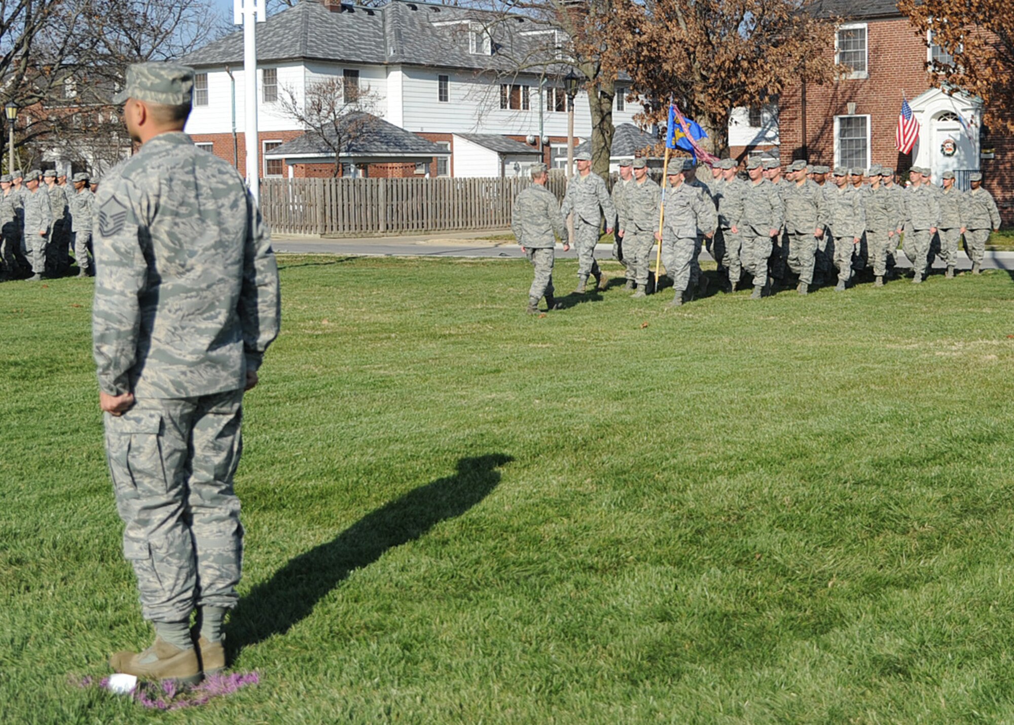 Squadrons prepare for a pass and review during the change of command ceremony at Scott Air Force Base Nov. 30, 2012. The incoming AMC commander, Gen. Paul J. Selva was previously assigned as the assistant to the Chairman of the Joint Chiefs of Staff in Washington D.C. The outgoing commander, Gen. Raymond E. Johns Jr. served 35 years in the Air Force, commanding more than 130,000 Airmen as well as reaching 4,500 flight hours in various aircraft. (U.S. Air Force photo/ Senior Airman Tristin English)