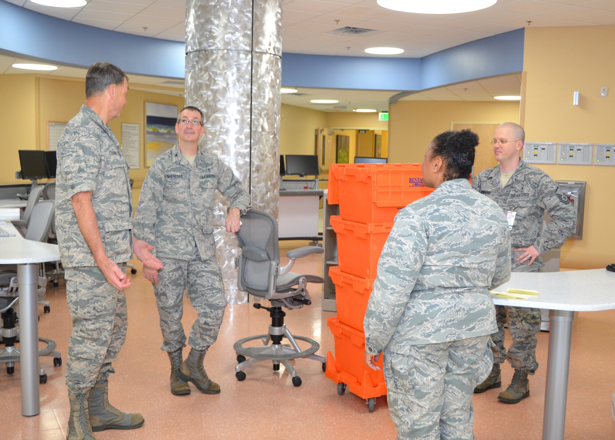Brig. Gen. (Dr.) Kory Cornum, 81st Medical Group commander, left, discusses the upcoming Surgical Inpatient Unit move into the Keesler Hospital’s new Back Bay Tower with, from left, Col. (Dr.) Michael Bashford, 81st Surgical Operations Squadron commander; Maj. Jacqueline Berry, 81st Inpatient Operations Squadron Surgical Inpatient Flight commander; and Master Sgt. John Howard, flight chief.  Berry and Howard showed the new unit to visitors during the Nov. 29, 2012 open house at Keesler Air Force Base, Miss. The tour was conducted for those enrolled with the hospital and staff members.  Departments that will be located in the tower begin moving in the week of Dec. 3 and it will be open to patient care about mid-month.  (U.S. Air Force photo by Steve Pivnick)