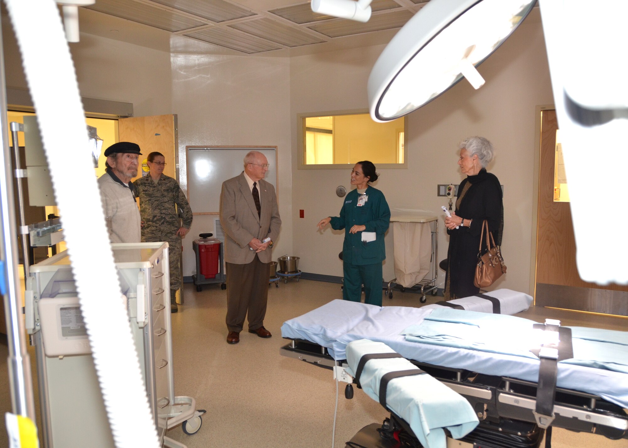Operating room nurse Maj. Margaret Clevenger, 81st Surgical Operations Squadron, shows one of the operating rooms at Keesler Hospital’s new Back Bay Tower to, from left, retired Tech. Sgt. Richard DuBey, retired Chief Master Sgt. Jerry Caldwell and Shirley DuBey, all of Biloxi.  They were touring the new facility during an afternoon open house Nov. 29, 2012 at Keesler Air Force Base, Miss. for those enrolled with the hospital and staff members.  Departments that will be located in the tower begin moving in the week of Dec. 3 and the tower will be open for patient care about mid-month.  (U.S. Air Force photo by Steve Pivnick)