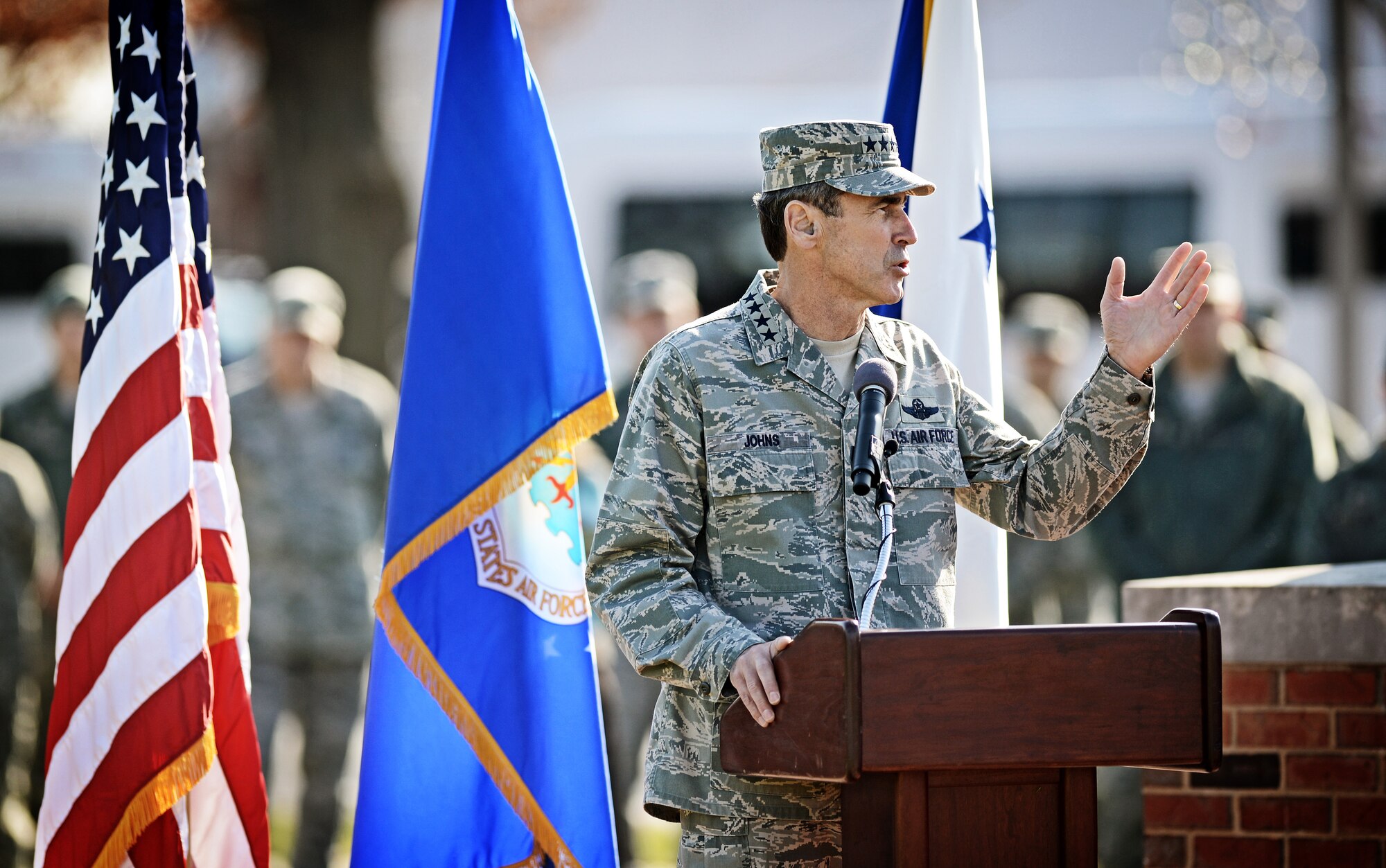 Gen. Raymond E. Johns Jr., Air Mobility Command commander, gives his farewell speech during the change of command ceremony at Scott Air Force Base Nov. 30, 2012. Johns served 35 years in the Air Force, commanding more than 130,000 Airmen as well as reaching 4,500 flight hours in various aircraft. The incoming AMC commander, Gen. Paul J. Selva, was previously assigned as the assistant to the Chairman of the Joint Chiefs of Staff in Washington D.C. (U.S. Air Force photo/Staff Sgt. Ryan Crane)
