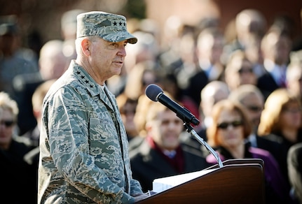Gen. Mark A Welsh III, Chief of Staff of the Air Force, speaks about the successful career of Gen. Raymond E. Johns Jr., Air Mobility Command commander, at the change of command ceremony at Scott Air Force Base, Nov. 30, 2012. Johns served 35 years in the Air Force, commanding more than 130,000 Airmen as well as reaching 4,500 flight hours in various aircraft. The incoming AMC commander, Gen. Paul J. Selva, was previously assigned as the assistant to the Chairman of the Joint Chiefs of Staff in Washington D.C. (U.S. Air Force photo/ Staff Sgt. Ryan Crane)