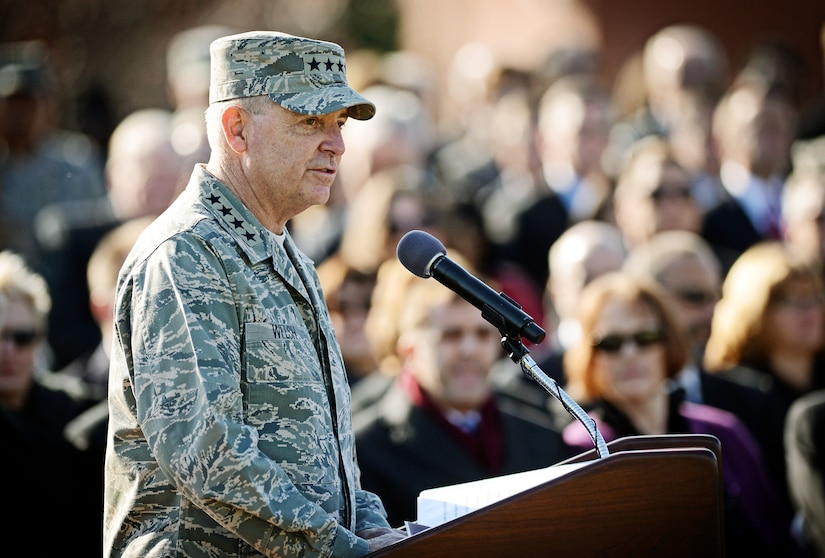 Gen. Mark A Welsh III, Chief of Staff of the Air Force, speaks about the successful career of Gen. Raymond E. Johns Jr., Air Mobility Command commander, at the change of command ceremony at Scott Air Force Base, Nov. 30, 2012. Johns served 35 years in the Air Force, commanding more than 130,000 Airmen as well as reaching 4,500 flight hours in various aircraft. The incoming AMC commander, Gen. Paul J. Selva, was previously assigned as the assistant to the Chairman of the Joint Chiefs of Staff in Washington D.C. (U.S. Air Force photo/ Staff Sgt. Ryan Crane)