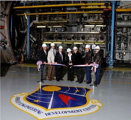 From left to right, Dr. Saeed Zadeh, AEDC Test Systems Sustainment Division’s chief of acquisitions; Kirk Rutland, technical director of the Test Systems Sustainment Division at AEDC; Britt Covington, AEDC executive director; Rosemary Matty, AEDC’s program manager for the Advanced Large Military Engine Capability (ALMEC) program; Dan Flanigan, ATA project manager; Col. Patrick Tom, AEDC Test Division director; and Lt. Col. Brent Peavy, AEDC’s Turbine Engine Ground Test Complex director, take part in a ribbon-cutting event marking the completion of the ASTF C1/C2 Temperature-controlled Cell Cooling project. (Photo by Rick Goodfriend)