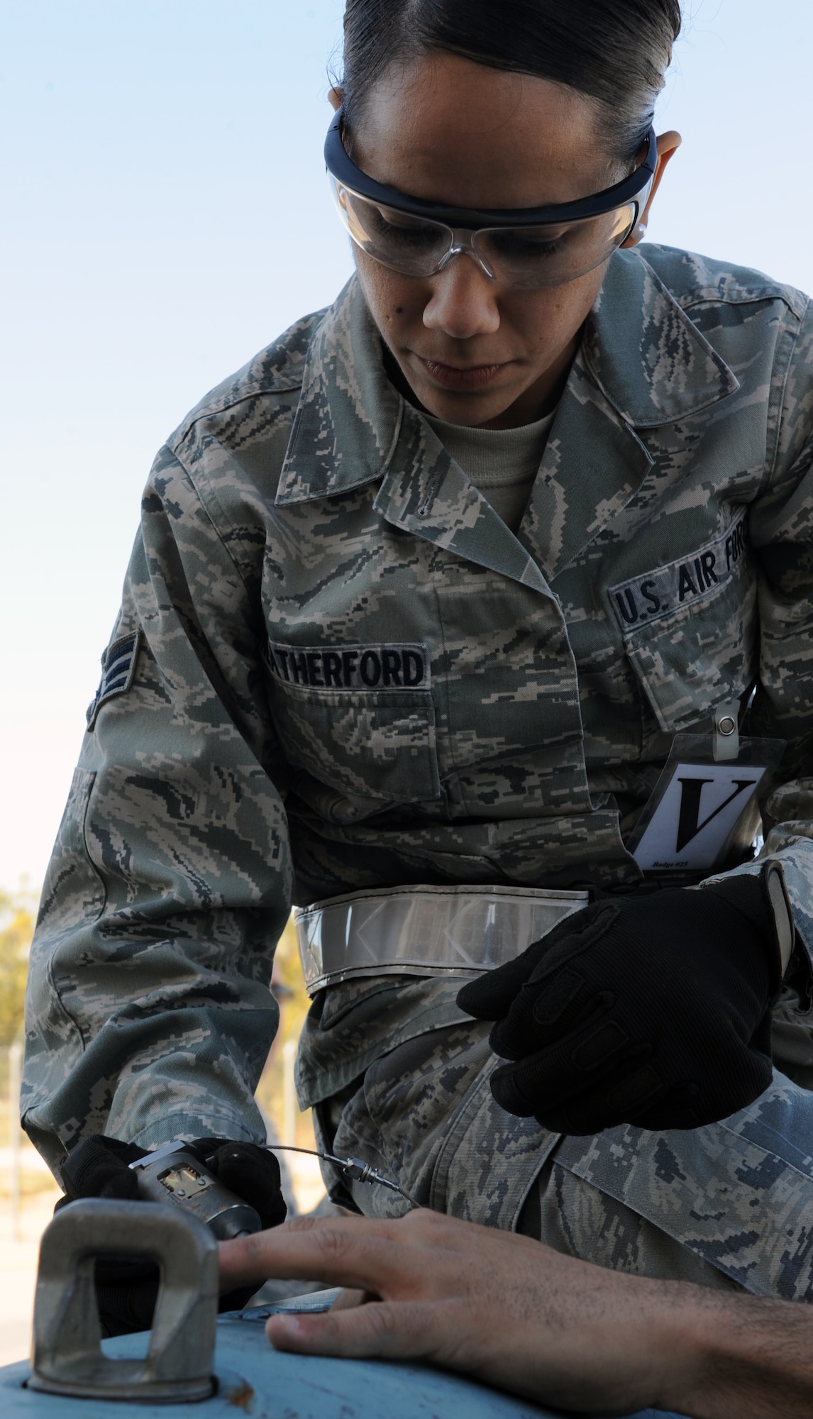Senior Airman Abrah Weatherford, 7th Operations Support Squadron, assembles an inert bomb during a 7th Munitions Squadron 101 course Nov. 28, 2012, at Dyess Air Force Base, Texas. The course welcomed multiple 7th Bomb Wing squadrons to better understand what it takes to build a bomb and the time that goes into it. (U.S. Air Force photo by Airman 1st Class Jonathan Stefanko/ Released)