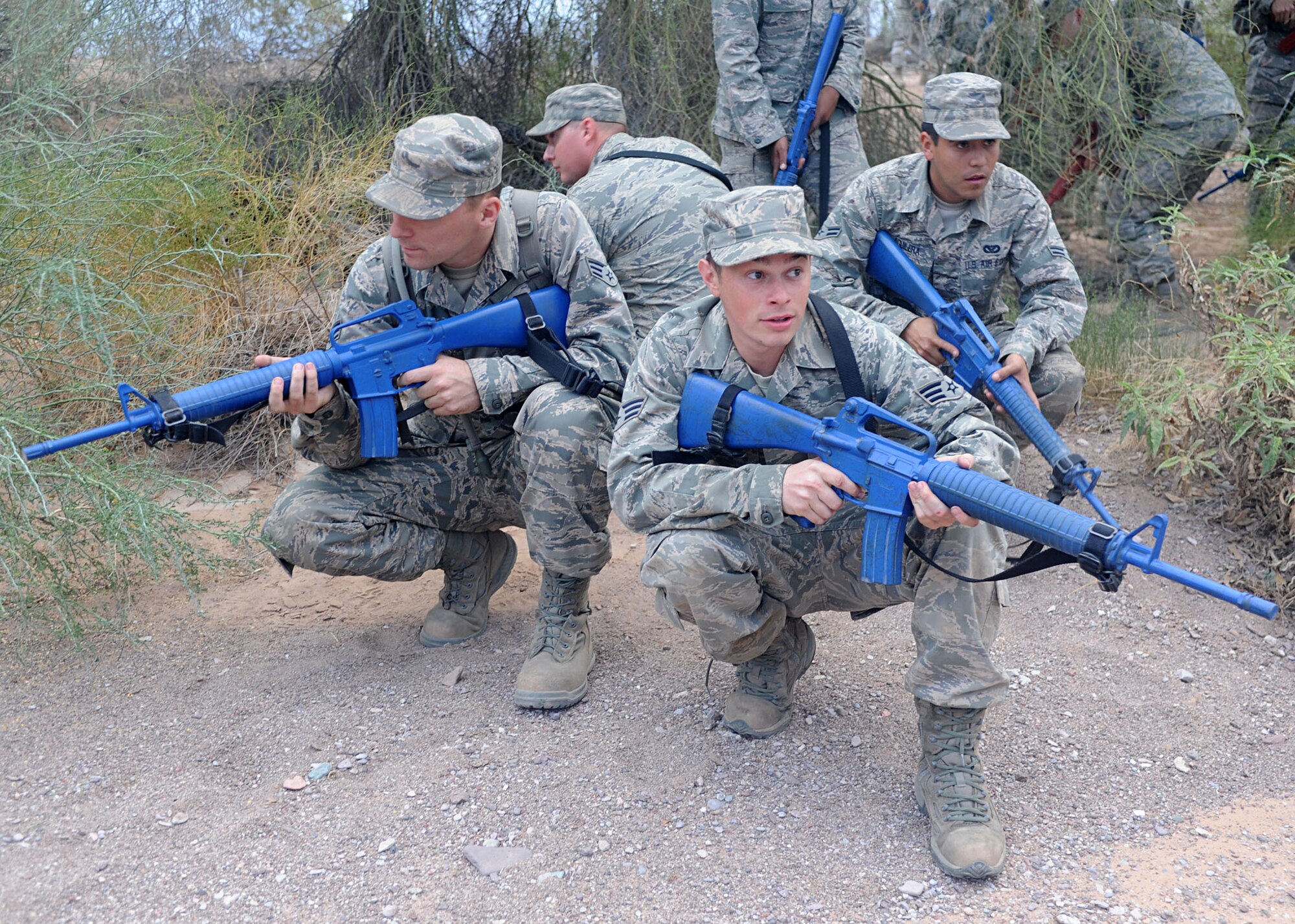 Members of the 56th Civil Engineer Squadron practice dismount patrol during the bivouac training. CES members also participated in training on self-aid buddy care and convoy operations. (U.S. Air Force photo by Airman 1st Class Devante Williams)
