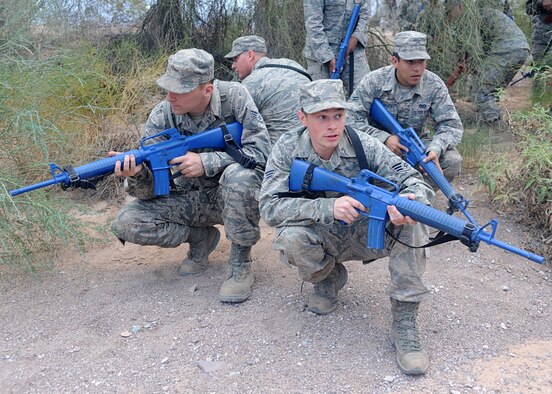 Members of the 56th Civil Engineer Squadron practice dismount patrol during the bivouac training. CES members also participated in training on self-aid buddy care and convoy operations. (U.S. Air Force photo by Airman 1st Class Devante Williams)