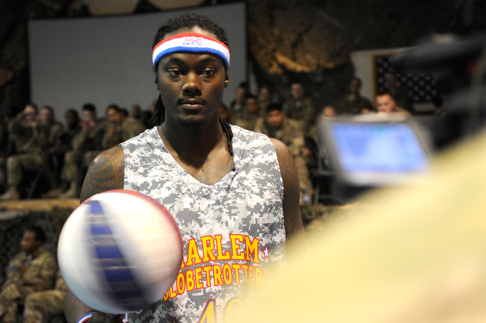 “Slick Willie” Shaw answers questions about the Globetrotters visit to Bagram Airfield, Afghanistan, Nov. 28, 2012. The visit was the first for the Globetrotters to Afghanistan, making it the 121st country and territory the team visited. (U.S. Air Force photo/ Master Sgt. Jun Kim)