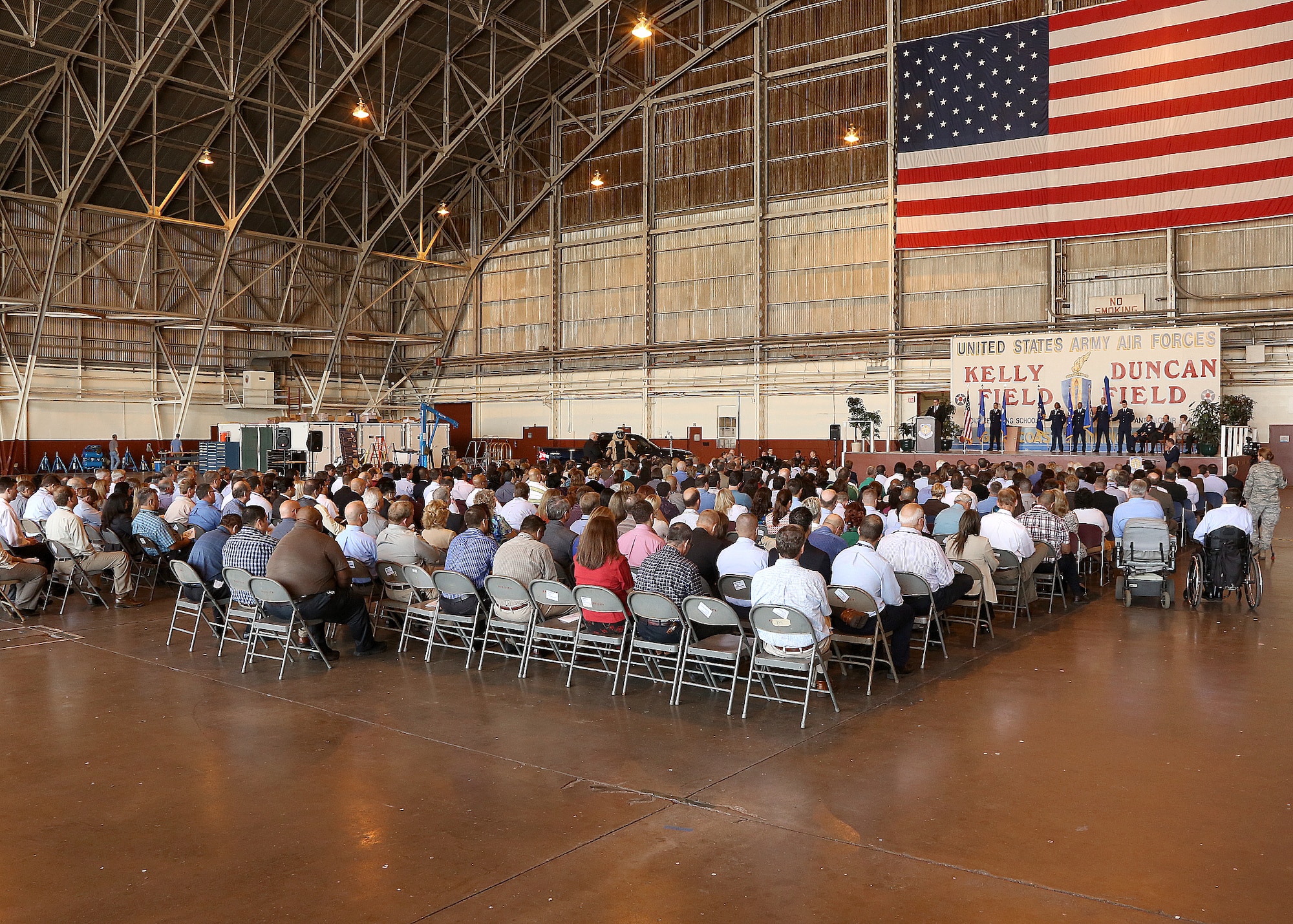 JOINT BASE SAN ANTONIO-LACKLAND, Texas -- More than 450 people attend a standup ceremony Oct. 1 in Hangar 1610 here for the newly formed Air Force Civil Engineer Center field operating agency, a subordinate to the Air Force Civil Engineer. The new FOA merges the Air Force Center for Engineering and the Environment and Air Force Real Property Agency, both based in San Antonio, with the Air Force Civil Engineer Support Agency at Tyndall Air Force Base, Fla., to form a more than 1,600-person strong unit. (U.S. Air Force photo/Robbin Cresswell)
