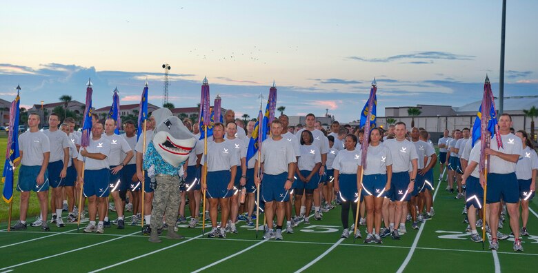 Units from the 45th Space Wing line up for the opening ceremonies of the 2012 Sports Week at Patrick AFB's WARFit field. (Photo by Matthew Jurgens)