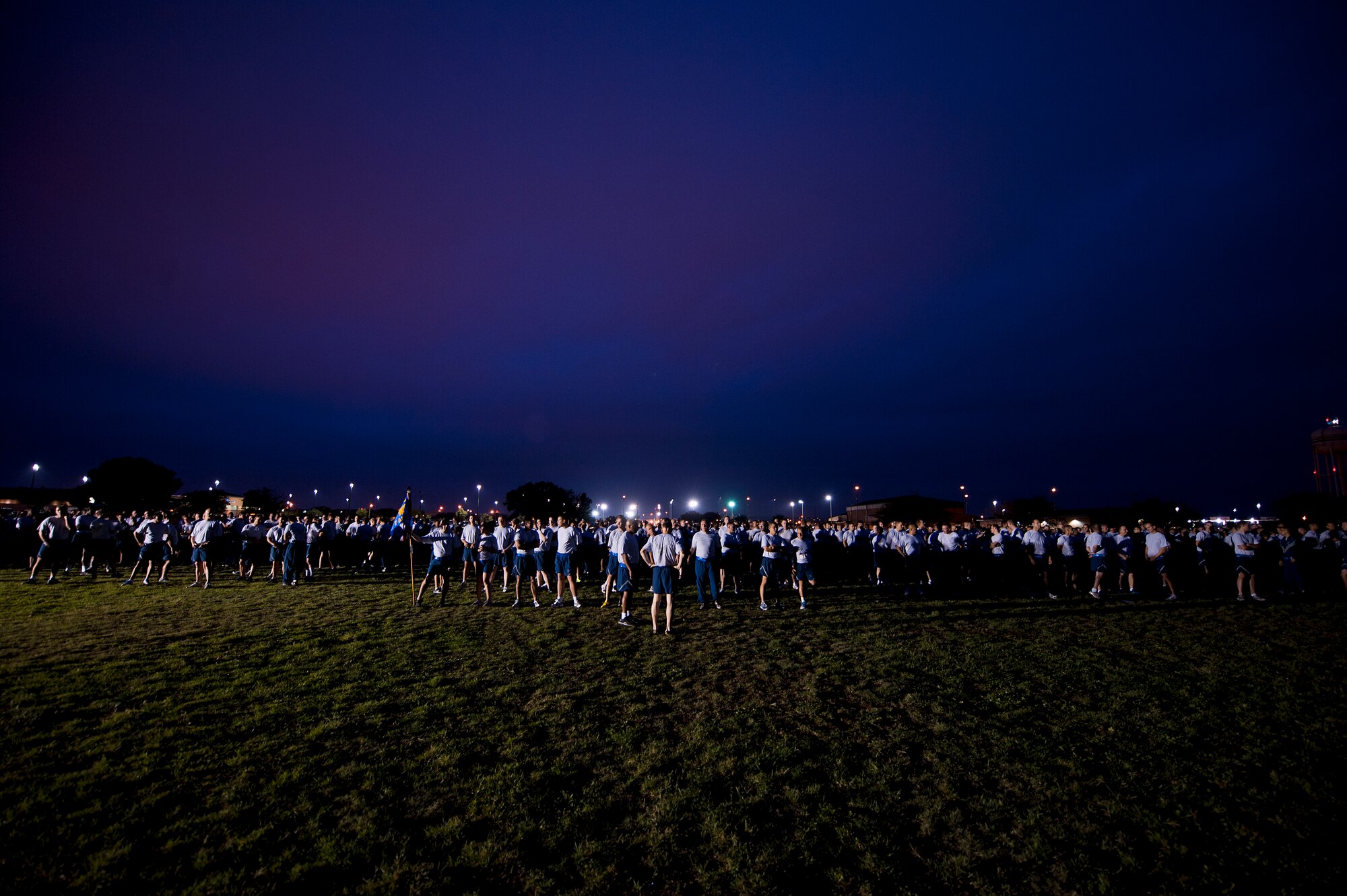 Airmen warm-up prior to a squadron run Sept. 28, 2012, as part of Comprehensive Airmen Fitness Day at Dyess Air Force Base, Texas. The day’s purpose was to strengthen understanding and application of CAF through interactive training and team-building activities. The resiliency training teaches Airmen to respond to stresses in life. There are 12 building blocks to developing resiliency. Each squadron had a resiliency training assistant who focused on teaching three of the 12 resiliency building blocks: assertive communication, hunt the good stuff and avoid thinking traps. (U.S. Air Force photo by Airman 1st Class Damon Kasberg/ Released)