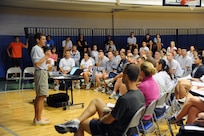 Mark Cucuzzella, a running performance and injury program educator, teaches Joint Base San Antonio-Randolph members about the importance of proper running footwear at the Randolph Fitness Center Sept. 27. Participants learned the importance running mechanics and how wearing proper running footwear improves performance and reduces the likelihood of running injuries.  (U.S. Air Force photo by Rich McFadden) 