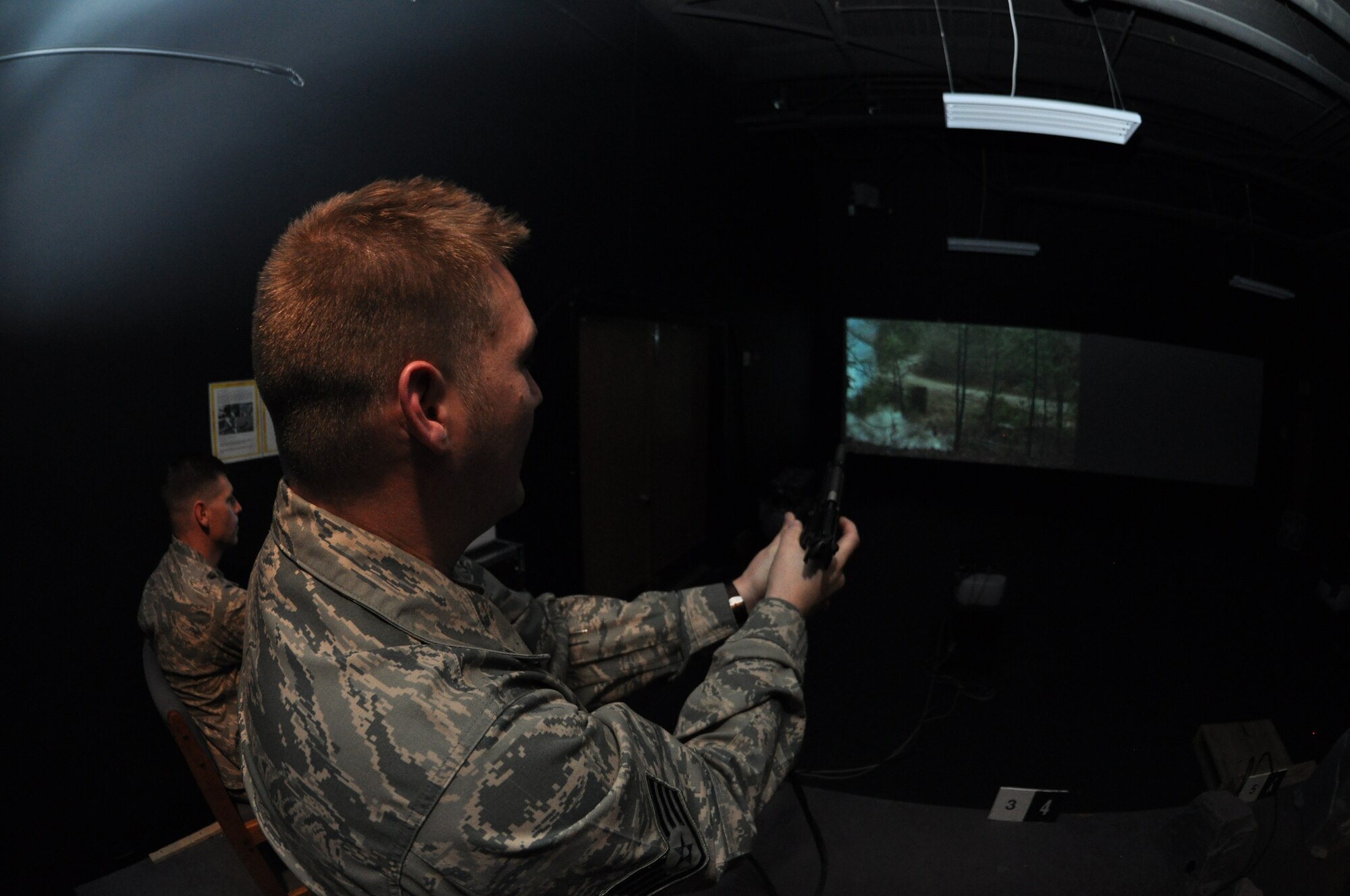 Staff Sgt. Sevrin Stalmark a Traditional Reservist with the 477th SFS and a member of the Anchorage Police Department receives M-9 training on the EST 2000 here. The 477th Security Forces Squadron is a part of the 477th Fighter Group, Alaska's only Air Force Reserve unit. (U.S. Air Force Reserve Photo/Tech. Sgt. Dana Rosso)