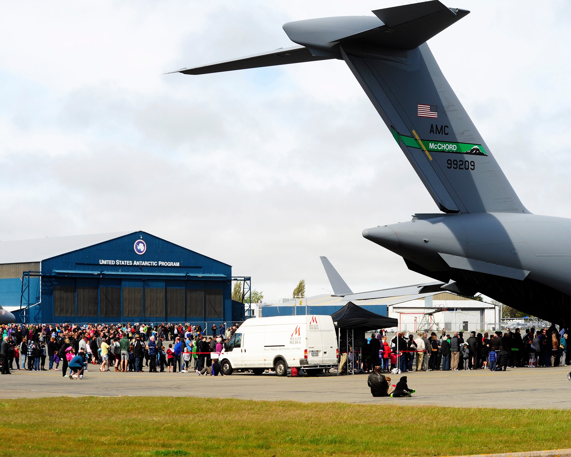 People line up to take a tour of a C-17 Globemaster III aircraft, Sept. 29, 2012 at Christchurch International Airport, New Zealand. The plane, deployed from Joint Base Lewis-McChord, accomodated more than 10,000 visitors from the Christchurch area as part of the city's IceFest event. (U.S. Air Force photo/Staff Sgt. Sean Tobin)