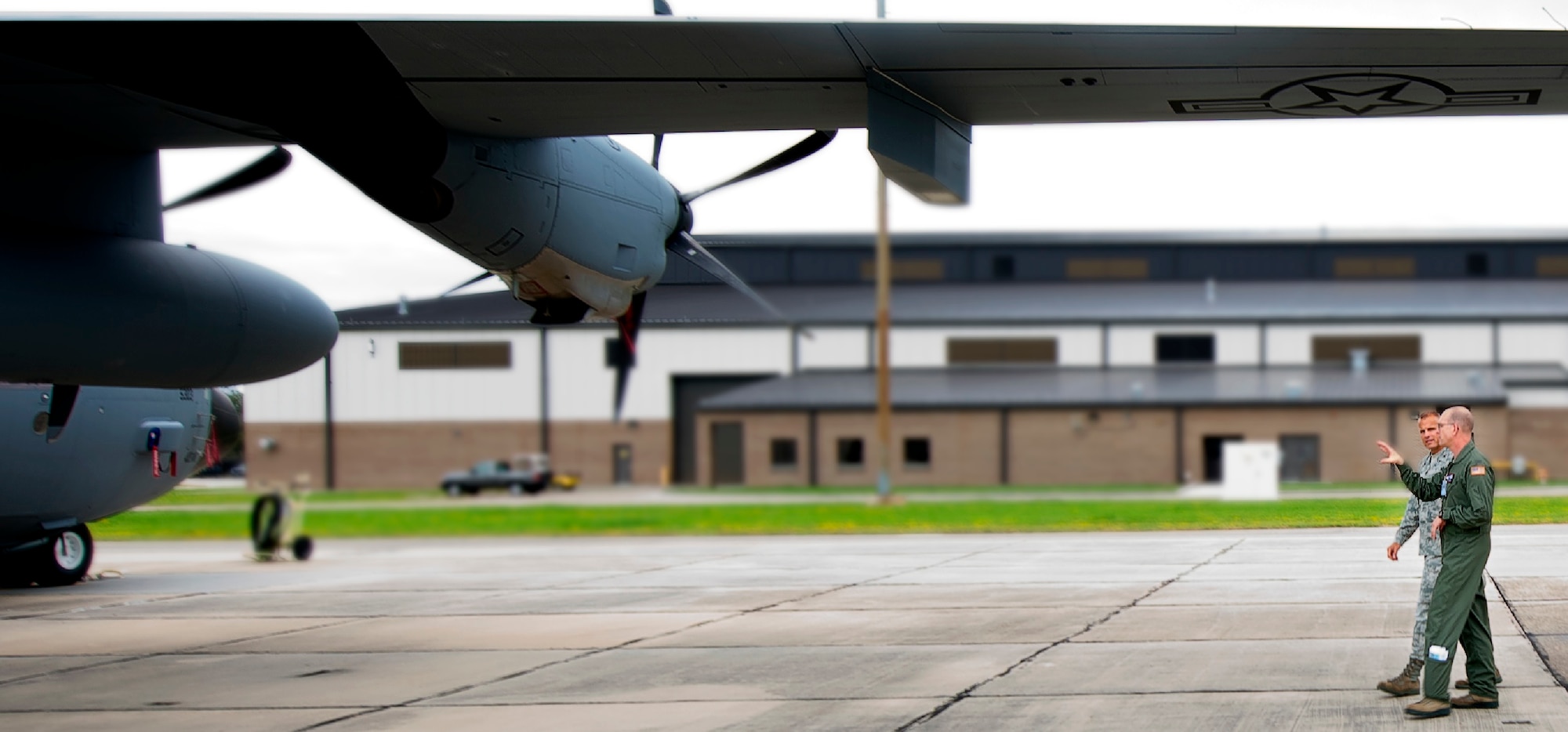 Col. Jay Jensen, Commander, 403rd Wing, gives Brig. Gen. Bradley Spacy, Commander, 81st Training Wing, a tour of the 403rd Wing, its facilities and aircraft. (U.S. Air Force Photo Illustration by Capt. J. Justin Pearce)