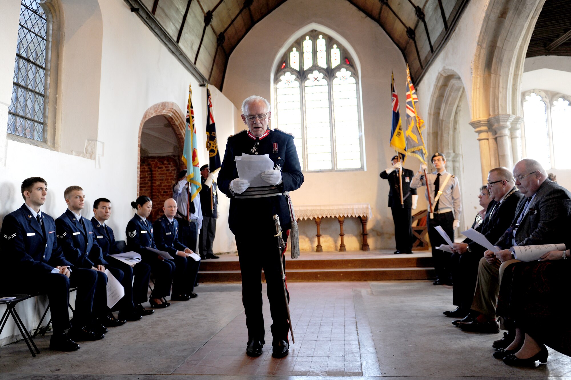 EAST HORNDON, England-- Lord Petre, Lord Lieutenant of Essex speaks words of commemoration during a remembrance service Sept. 29, 2012, at the Church of All Saints. This service was to commemorate the 69th anniversary of the Sept. 26, 1943, air disaster involving the Dorsal Queen and Raunchy Wolf.   The two B-17 Flying Fortresses collided killing 21 Americans who were returning to England following a bombing mission during World War II. Airmen assigned to RAF Mildenhall were invited to the ceremony to present a wreath in honor of the deceased. (U.S. Air Force photo/Master Sgt. Brian M. Boisvert)
