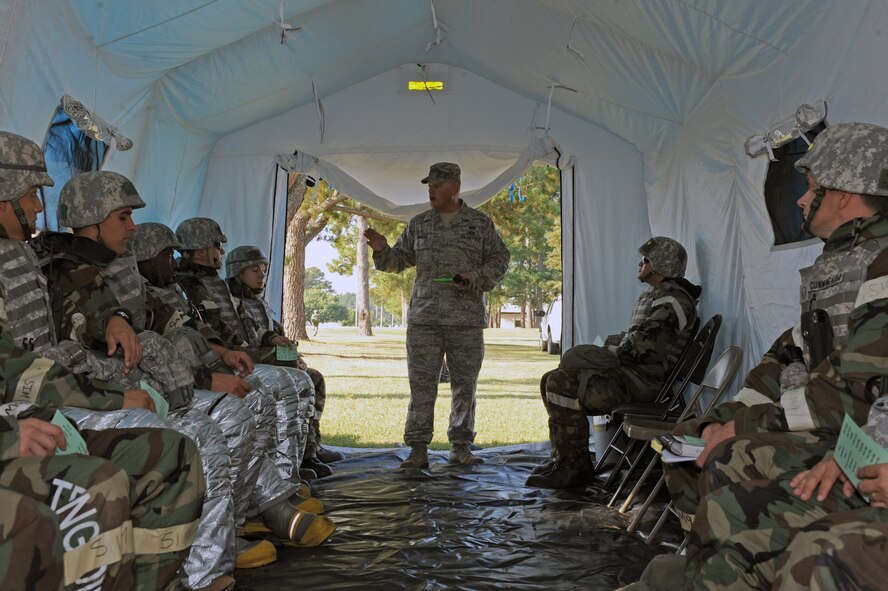 U.S. Air Force Master Sgt. Thomas Breckel, 4th Civil Engineer Squadron NCO in-charge of plans and operations, briefs Airmen attending an ability to survive and operate exercise on Seymour Johnson Air Force Base, N.C., Sept. 26, 2012. The ATSO exercise provided Airmen with an essential understanding of their unit’s ability to survive and operate by testing them in eight different readiness categories. (U.S. Air Force photo/Airman 1st Class John Nieves Camacho/Released)