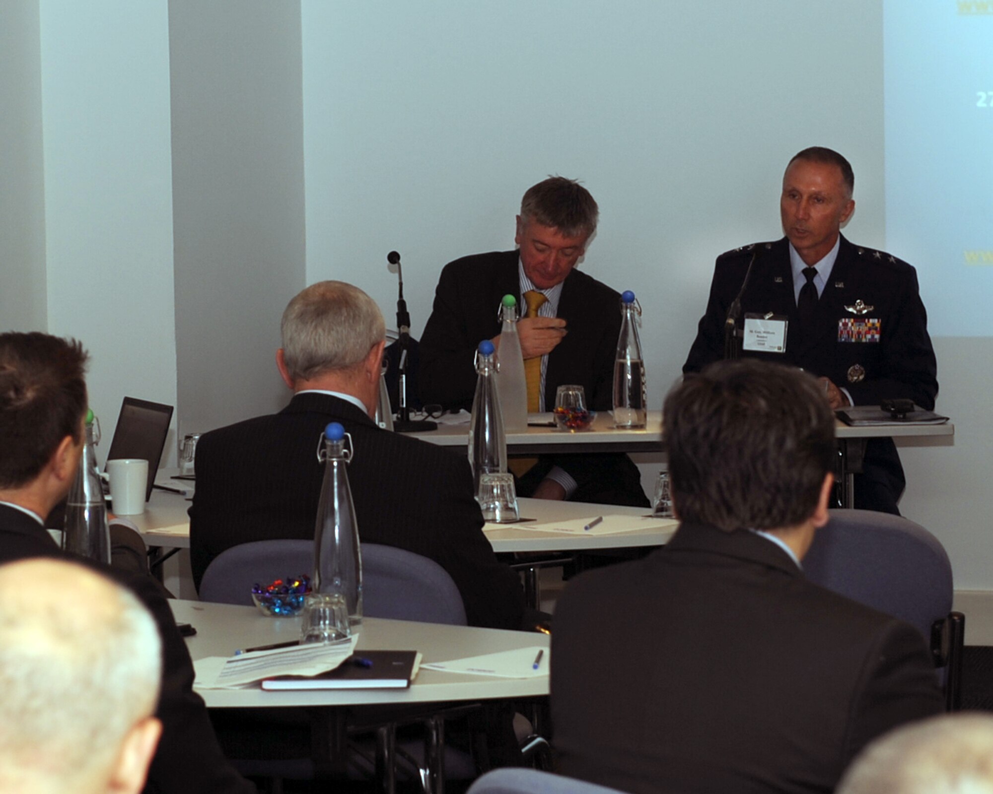 Maj. Gen. William Bender, U.S. Air Force Expeditionary Center commander, addresses representatives from NATO and the U.S. at a conference in London, Sept. 26, 2012. Key topics of discussion focused on ways to more effectively conduct military airlift operations. The general elaborated on the future of the C-130J Super-Hercules program, the KC-46 fleet and how NATO and the U.S. could ill afford to throw teamwork by the wayside. Additionally, Bender made a site visit to RAF Mildenhall’s 727th Air Mobility Squadron, a tenant unit there under his chain of command. (U.S. Air Force photo/2nd Lt Christopher Mesnard)
