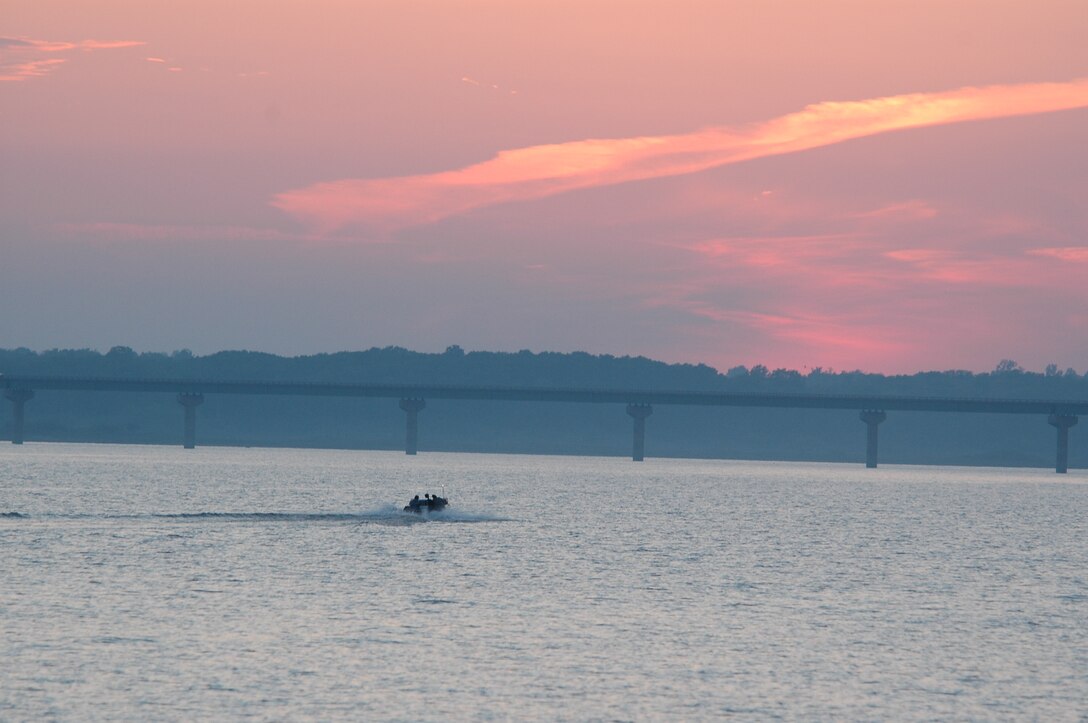Boating towards the Mile Long Bridge at sunset