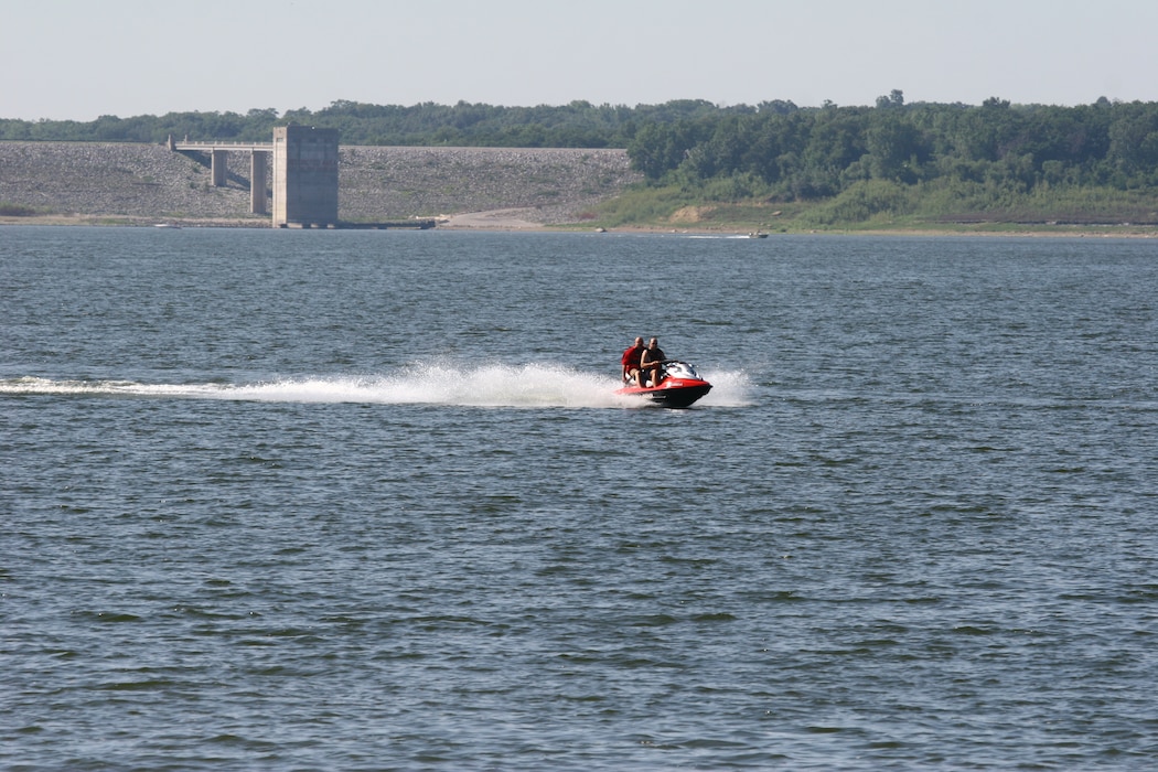 A jet ski moves across Saylorville Lake