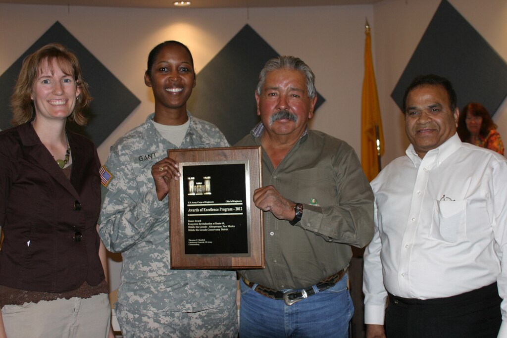 From L to R: District Project Manager Alicia Austin Johnson, District Commander Lt. Col.
Antoinette Gant, Middle Rio Grande Conservancy District Vice-Chair Eugene Abeita, and
MRGCD Chief Engineer Subhas K. Shah accept the award for ecosystem revitalization work in the Rio Grande Bosque, providing foraging and nesting habitat for 80 percent of vertebrate species in the region.
