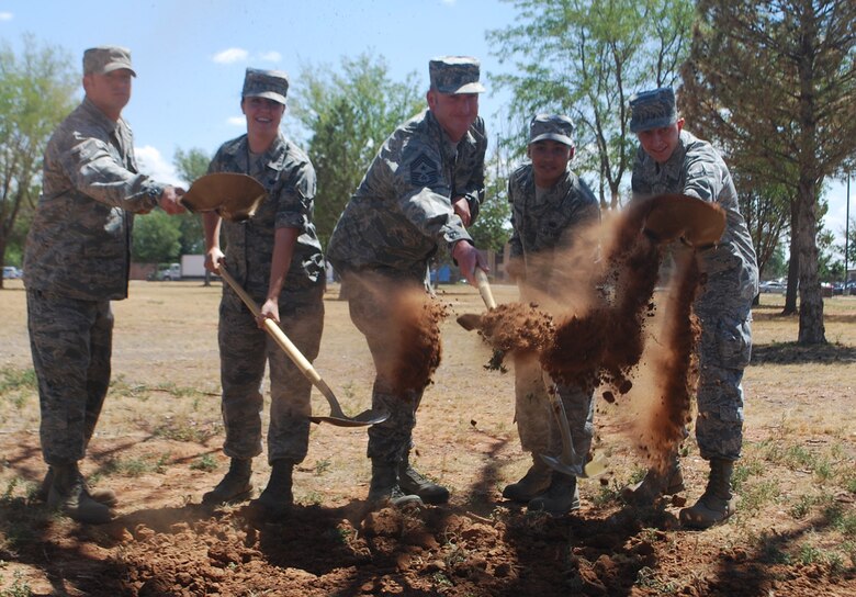 Participants in the groundbreaking ceremony for the new dorm were (L to R): Tech. Sgt. Matthew Smith, Airman 1st Class Samantha Crenshaw, Command Chief Master Sgt. Paul Henderson, Airman 1st Class Andrew Athanasiadis, and Airman 1st Class Kyle Riess.