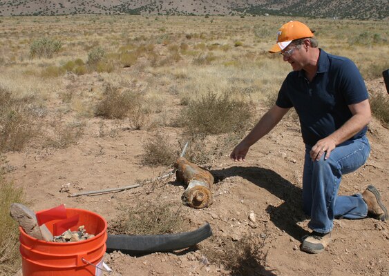 Albuquerque District’s Ordnance and Explosive Safety Expert Steve Carpenter is called to look at some debris at the site.  Carpenter is part of the Corps’ team on hand to monitor project activity.