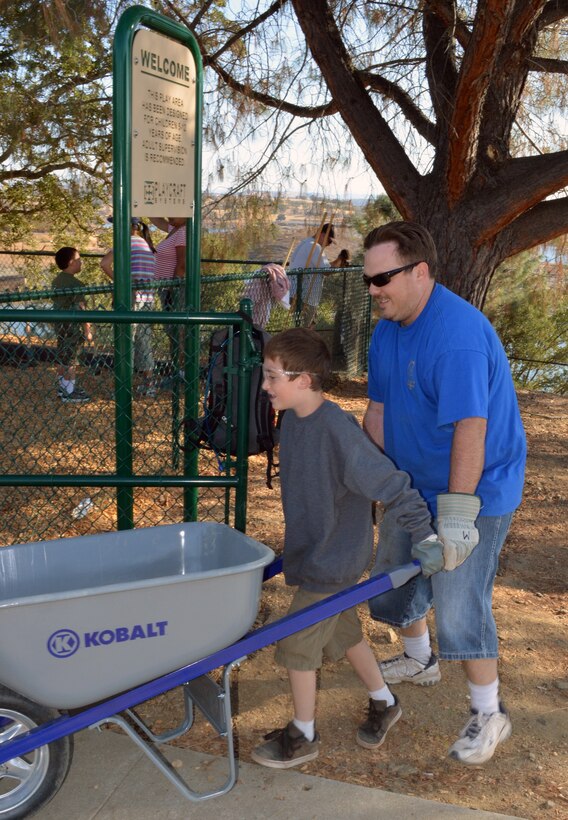 Scouts and leaders from Scout Group 423, Manteca, Calif., help build new barbecue grills at New Hogan Lake during National Public Lands Day, Sept. 29, 2012. Over 160 volunteers worked at New Hogan Lake during the event.