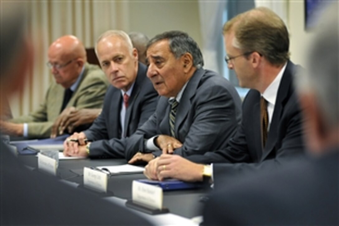 Defense Secretary Leon E. Panetta welcomes members of nonprofit and veteran service organizations participating in a roundtable discussion at the Pentagon, Oct. 1, 2012.