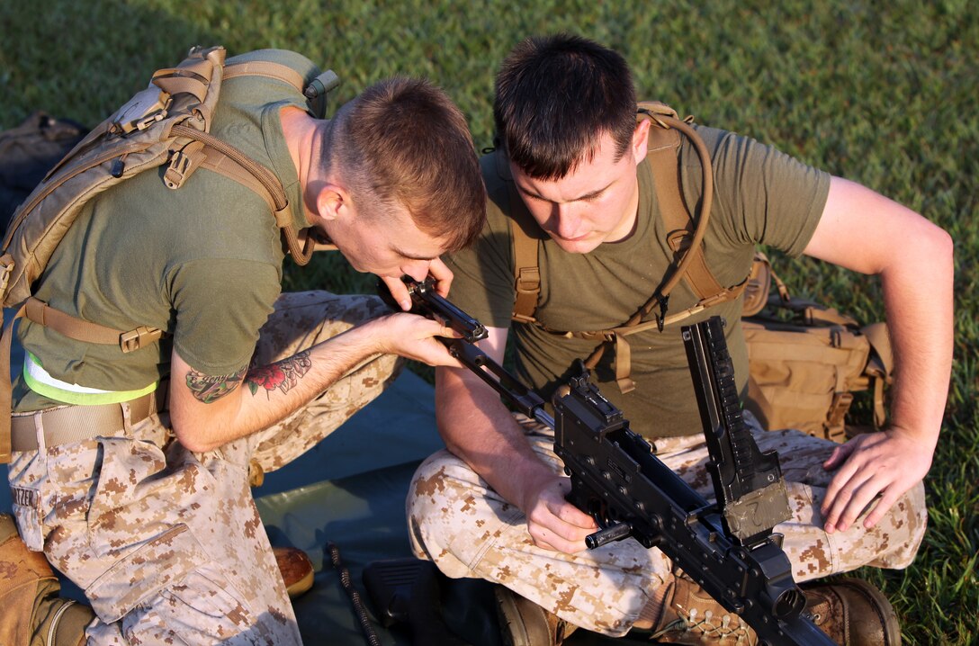Marines with Combat Logistics Battalion 6, 2nd Marine Logistics Group assemble a M-240 machine gun during a competition aboard Camp Lejeune, N.C., Sept. 27, 2012. During the event, the battalion’s Marines completed several obstacles as a team and competed for the best time. 