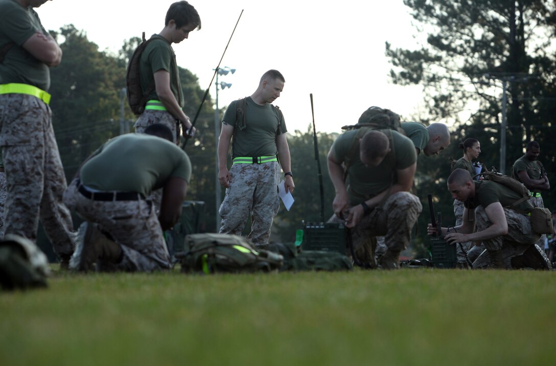 Marines with Combat Logistics Battalion 6, 2nd Marine Logistics Group program communication systems during a competition aboard Camp Lejeune, N.C., Sept. 27, 2012. Setting up communications with the unit proved to be the most difficult part of the challenge for many of the teams. 