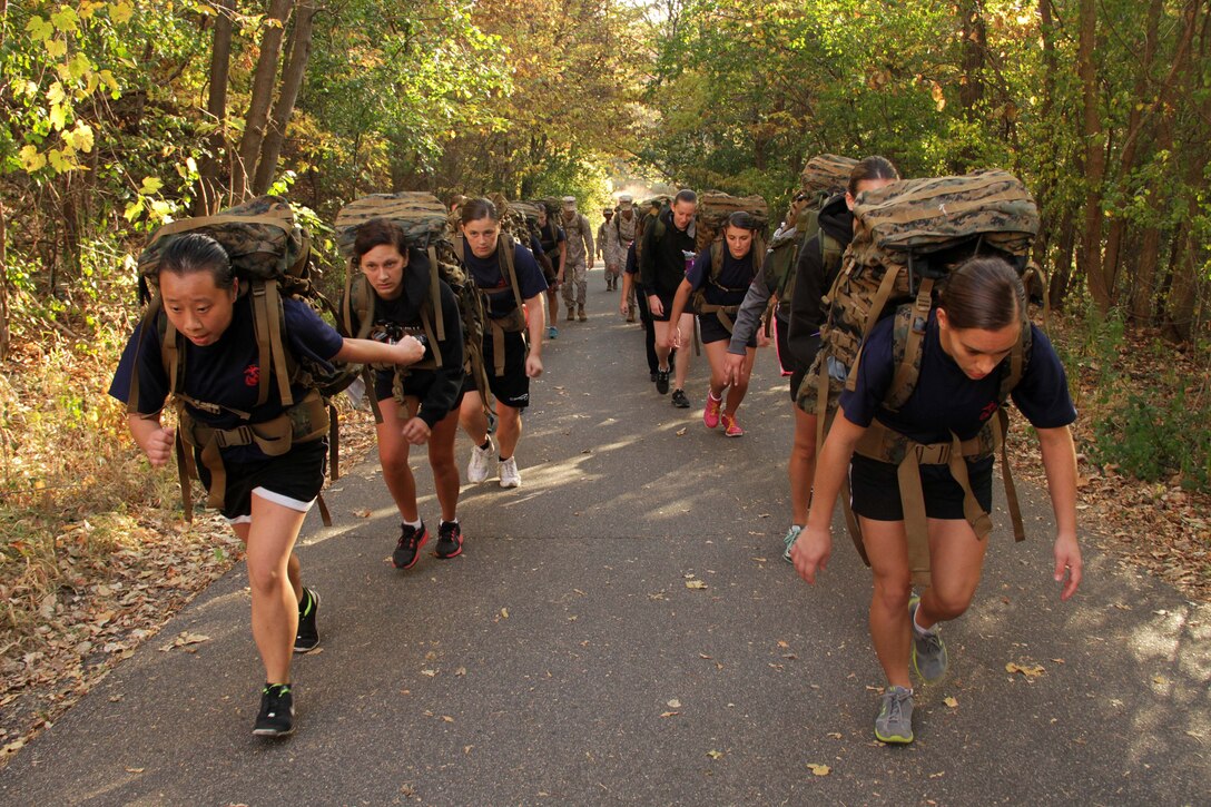 Twenty-eight aspiring Marines with Recruiting Station Twin Cities surge up a hill during a five-mile hike at a female pool function on Sept. 30. For additional imagery from the event, visit www.facebook.com/rstwincities. 