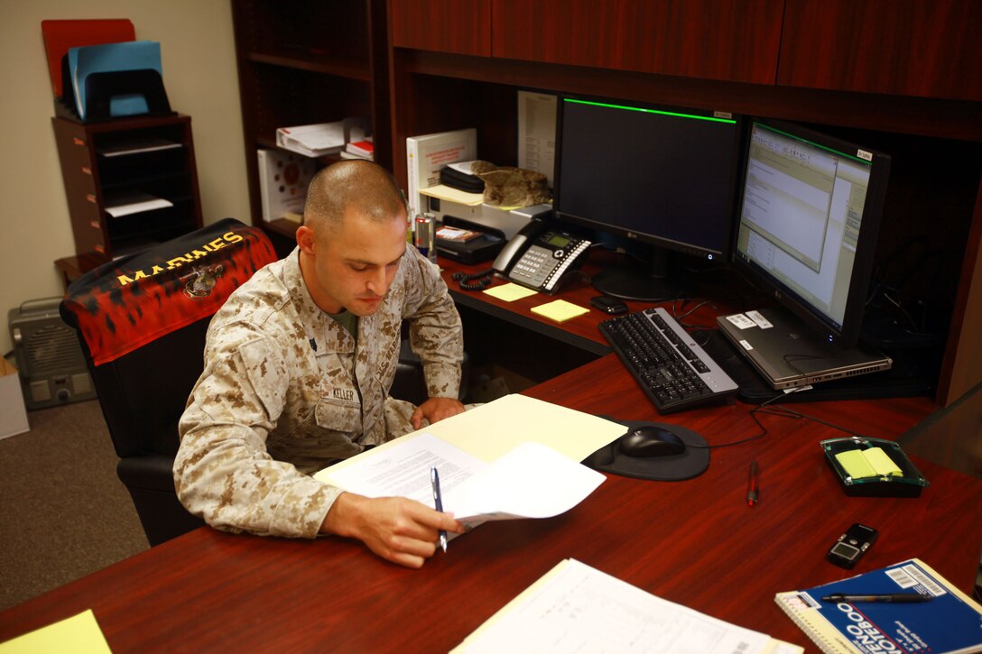 Sgt. Jeffery R. Keller, the battalion legal chief for 2nd Maintenance Battalion, Combat Logistics Regiment 25, 2nd Marine Logistics Group, looks over paper work while he serves as the acting battalion sergeant major during One Bullet Away Day aboard Camp Lejeune, N.C., Sept. 20, 2012. The Piscataway, N.J., native was in charge of the battalion’s enlisted Marines, and helped set the agenda for the day.