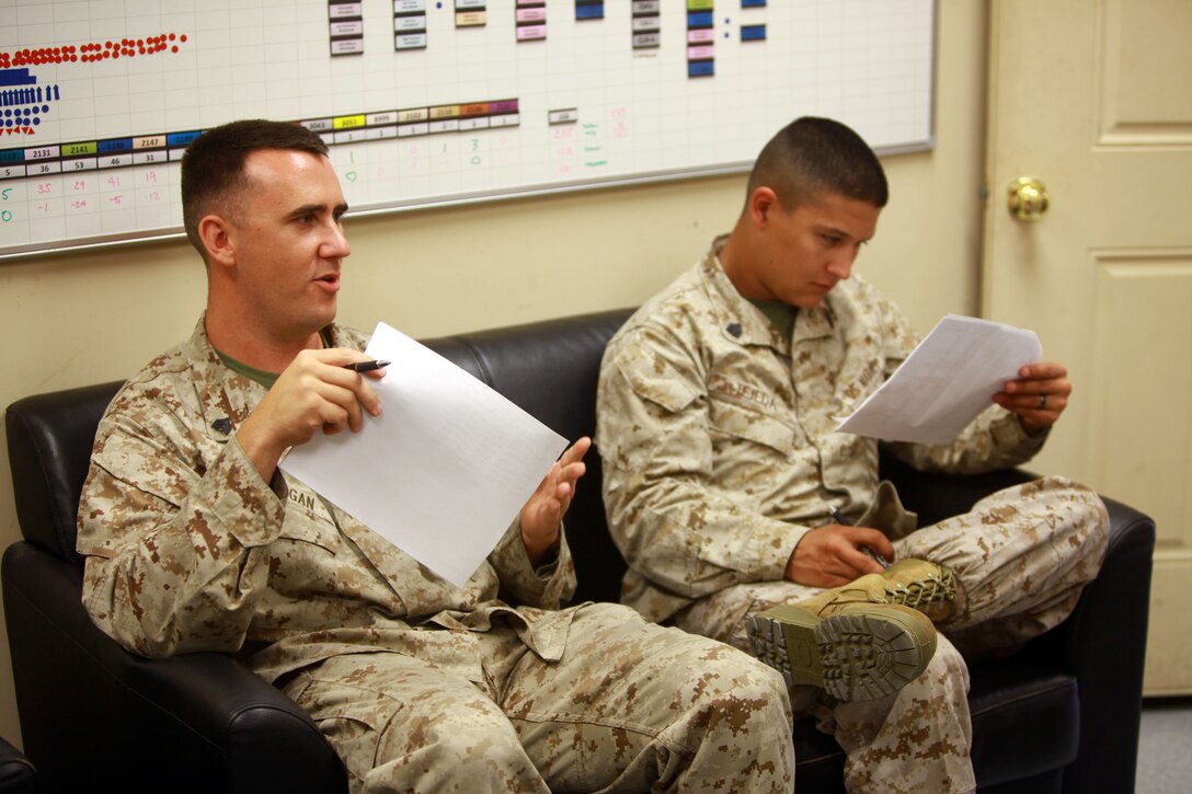 Marines with 2nd Maintenance Battalion, Combat Logistics Regiment 25, 2nd Marine Logistics Group negotiate tasks that need to be completed during One Bullet Away Day aboard Camp Lejeune, N.C., Sept. 20, 2012. Servicemembers were chosen to perform as senior leaders, while the battalion’s staff noncommissioned officers took a day off to build senior leadership cohesion. 