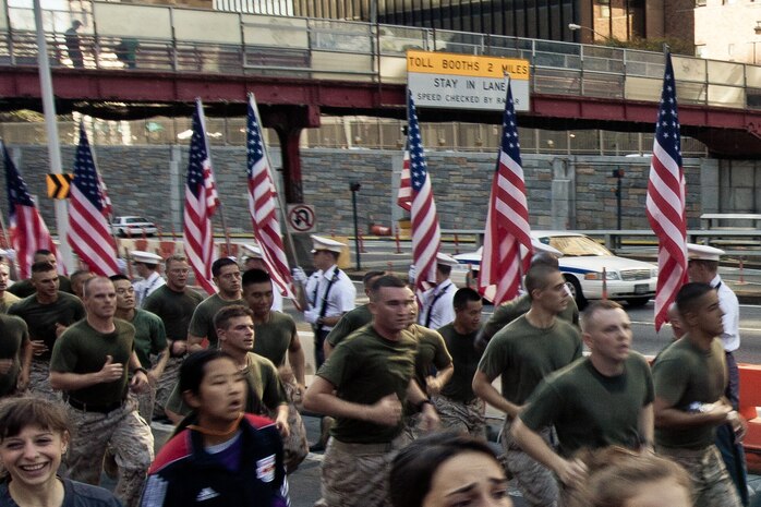 NEW YORK -- Marines ran the New York City Tunnel to Towers Run, Sept. 30. United States Military Academy at West Point cadets and FDNY firefighters lined the final stretch of the run. The run is in support of the Stephen Siller Tunnel to Towers Foundation, which works to build homes for injured troops and provide scholarships to the children of fallen service members and firefighters. Siller was an off-duty New York City firefighter who headed back to the city to help after the attacks on 9/11. When he reached as far as car traffic would allow he strapped his 65-lbs of gear on ran through the Brooklyn Battery Tunnel to join his fellow firefighters. The 5km run retraces his steps to the base of the World Trade Center. Siller died while helping with the rescue effort. (Official Marine Corps photo by Sgt. Randall Clinton)