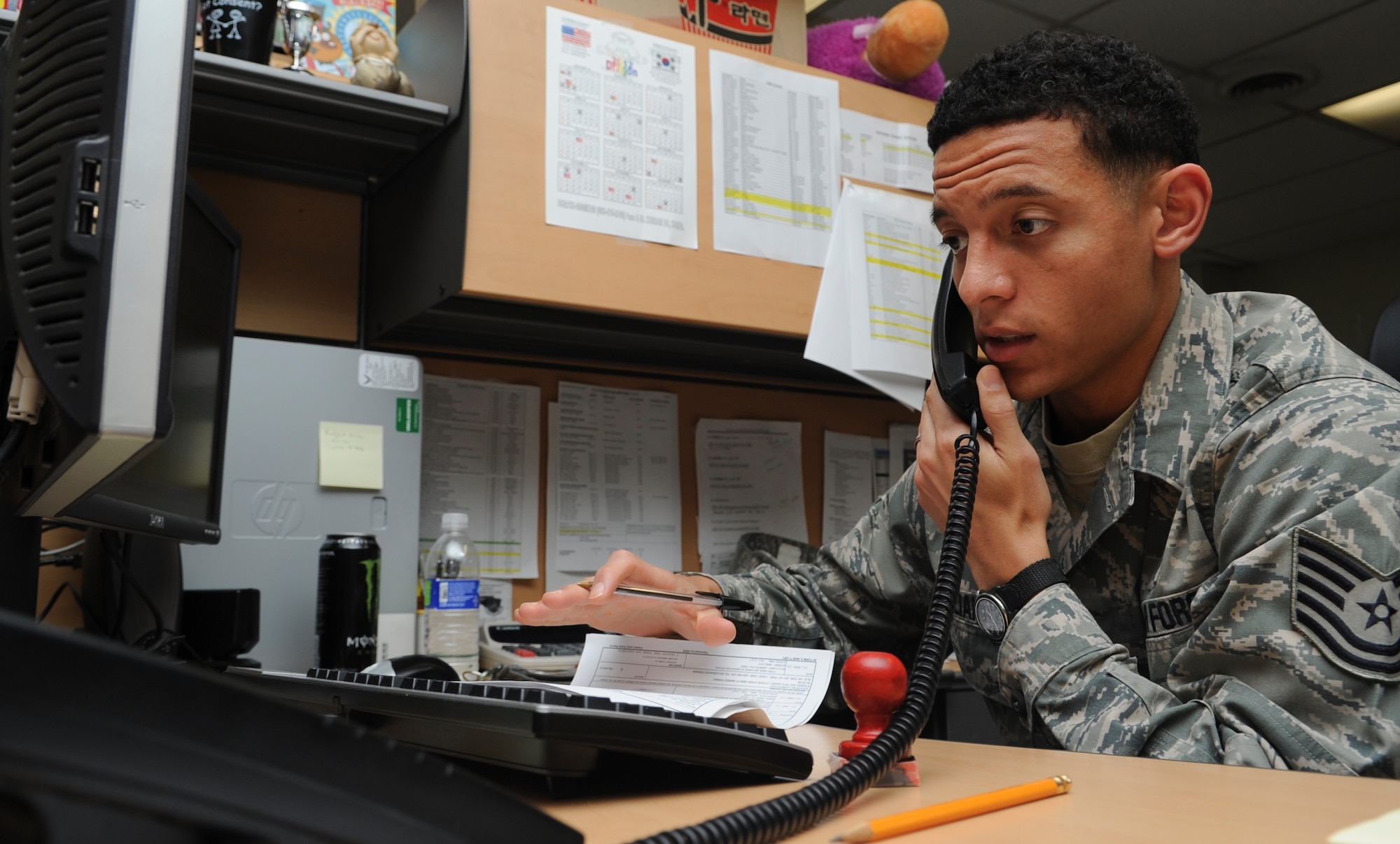 Tech. Sgt. Demetrius Williams, 8th Comptroller Squadron financial analyst, works during the closeout of the fiscal year Sept. 28, 2012, at Kunsan Air Base, Republic of Korea. Beginning in August, the analysts worked long hours and weekends to make sure the base budget was closed out on time.  (U.S. Air Force photo/Senior Airman Brigitte N. Brantley)