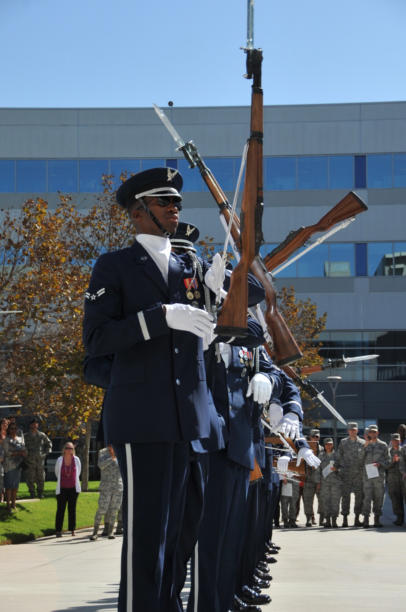 The Air Force Drill Team demonstrates precise maneuvers with a bayonet during a performance at Los Angeles AFB, Sept. 14. The team was here during their tour of Southern California, which included stops at local high schools and an appearance on the KTLA-TV Morning News. The team was named the best of the best in this year’s Joint Service Honor Guard Drill Competition. (Photo by Sarah Corrice) 