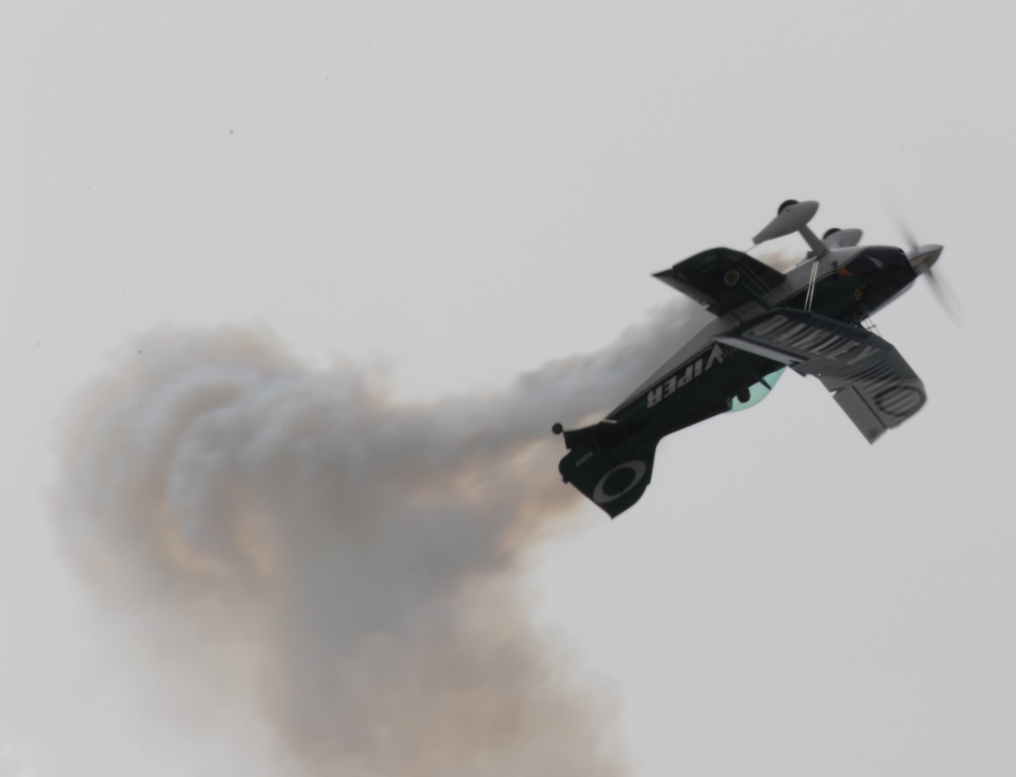 Jason Newburg, aerobatics pilot, maneuvers in the air during the 2012 “Wings Over McConnell” Open House and Air Show Sept. 30, 2012, McConnell Air Force Base, Kan. Newburg was one of several pilots to showcase the capabilities of smaller propeller-powered planes to the crowds at the air show. (U.S. Air Force photo/Airman 1st Class Victor J. Caputo)